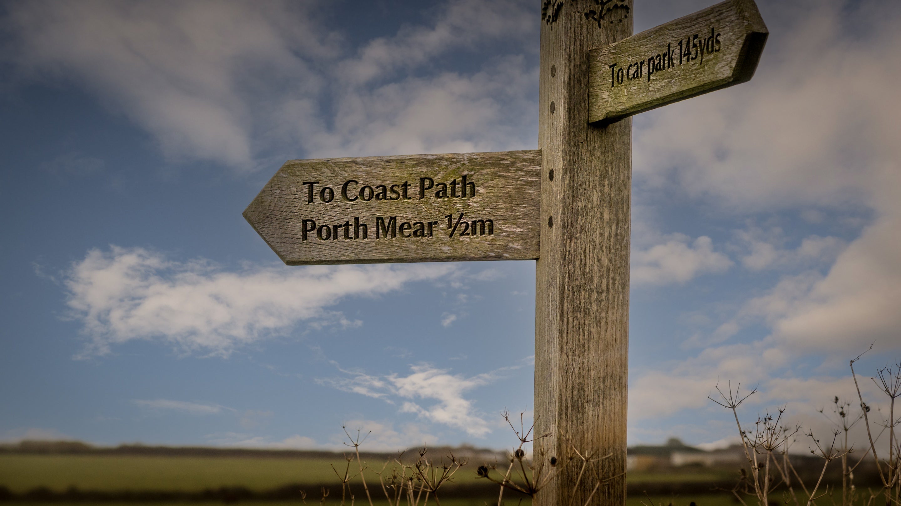 Signs for coast path trails near Trescore, Cornwall