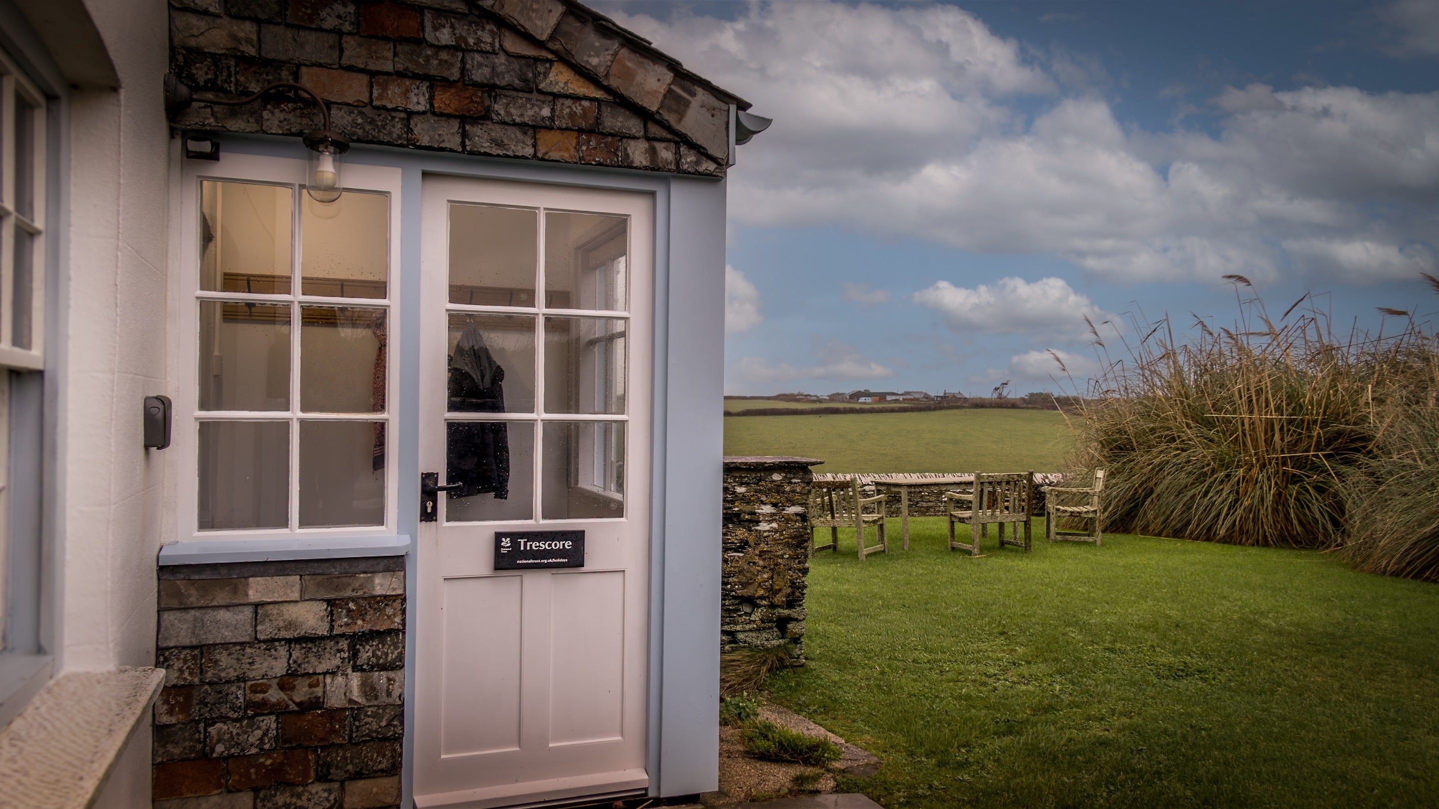 The entrance porch and garden at Trescore, Cornwall
