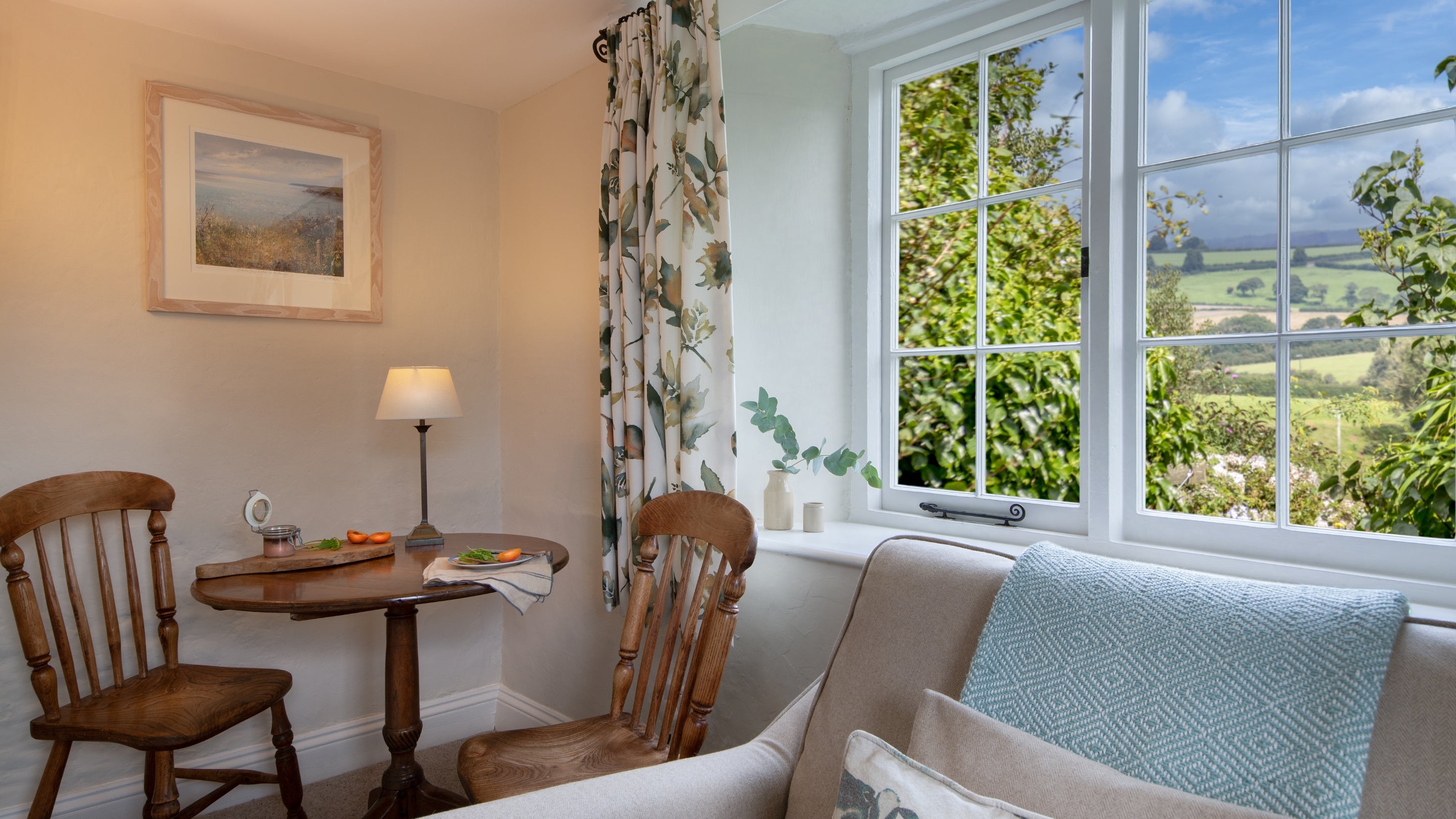 The sitting and dining room at Triggabrowne Dairy Cottage, Cornwall