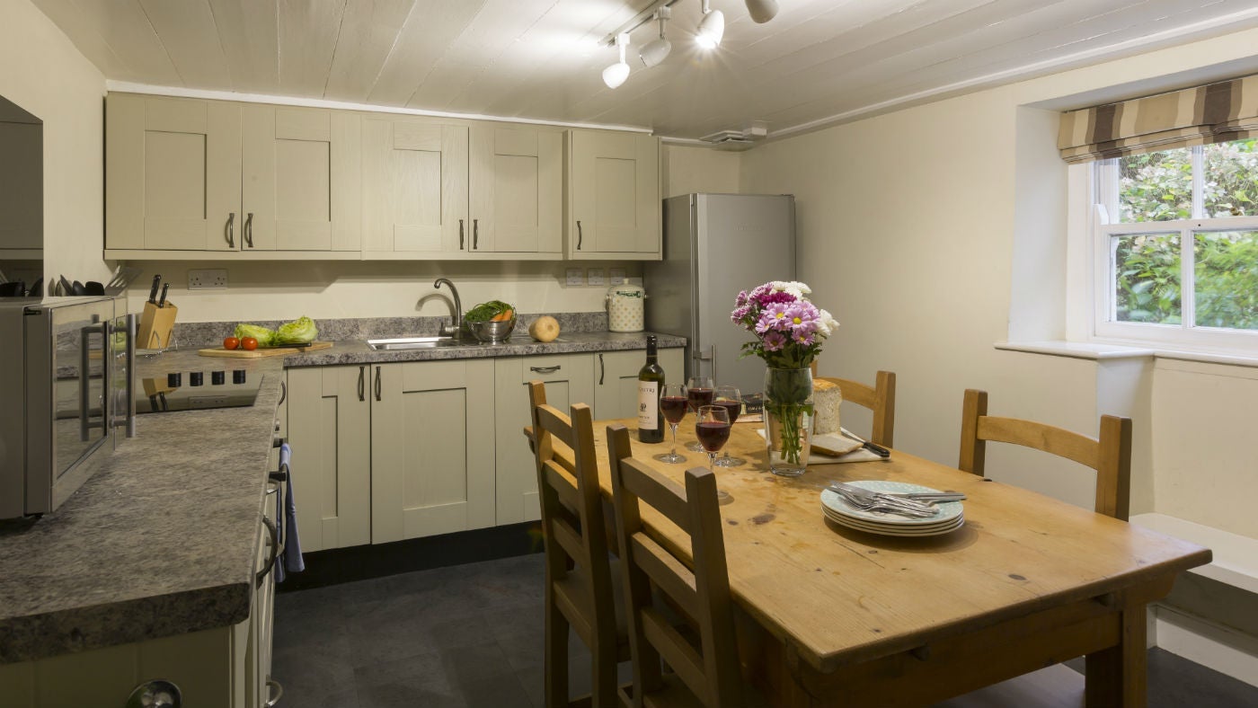 The kitchen and dining area at Triggabrowne Farm House, Lanteglos-by-Fowey, Cornwall