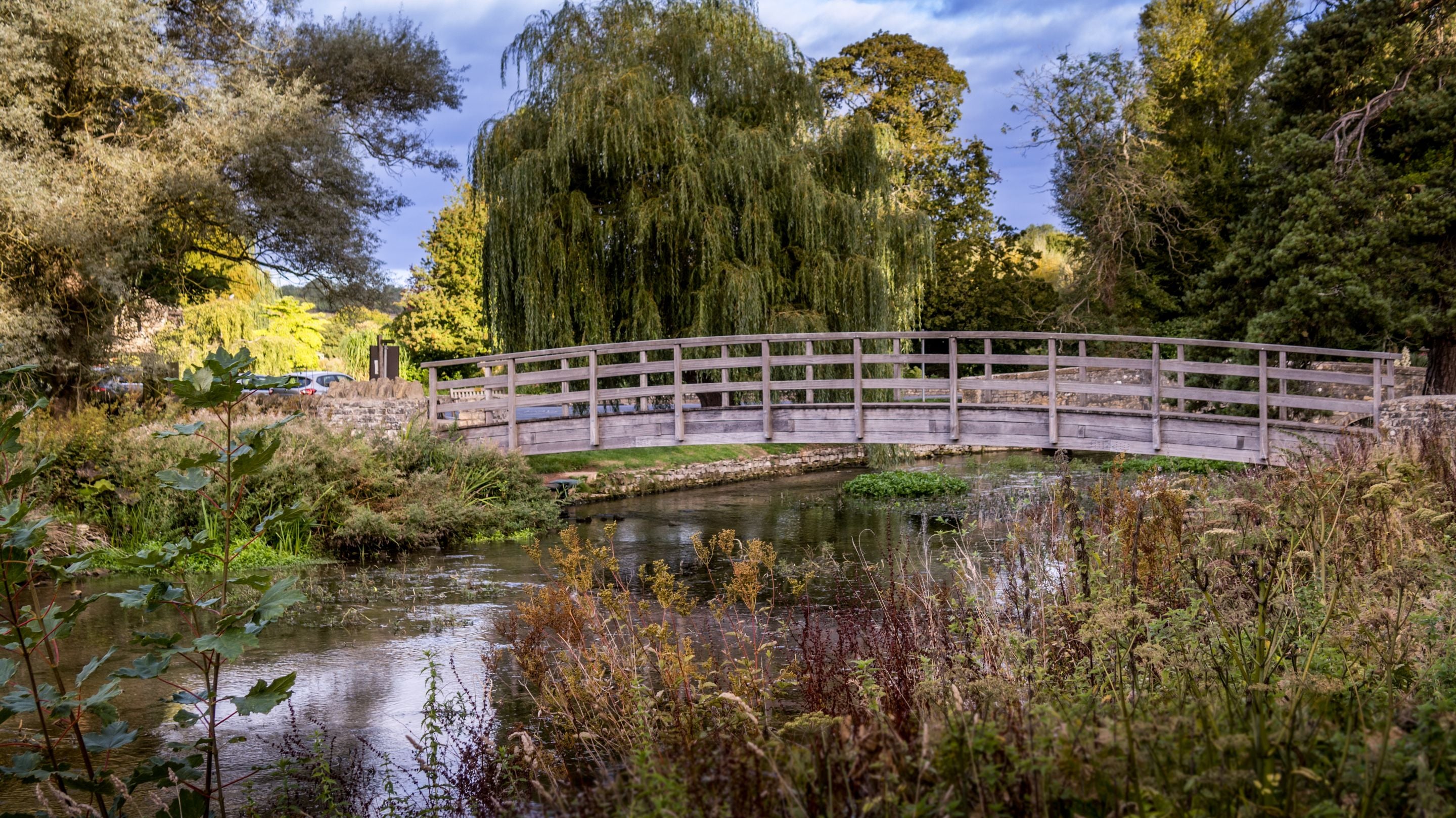 A bridge over the River Coln in Bibury, near 1 Arlington Row, Gloucestershire