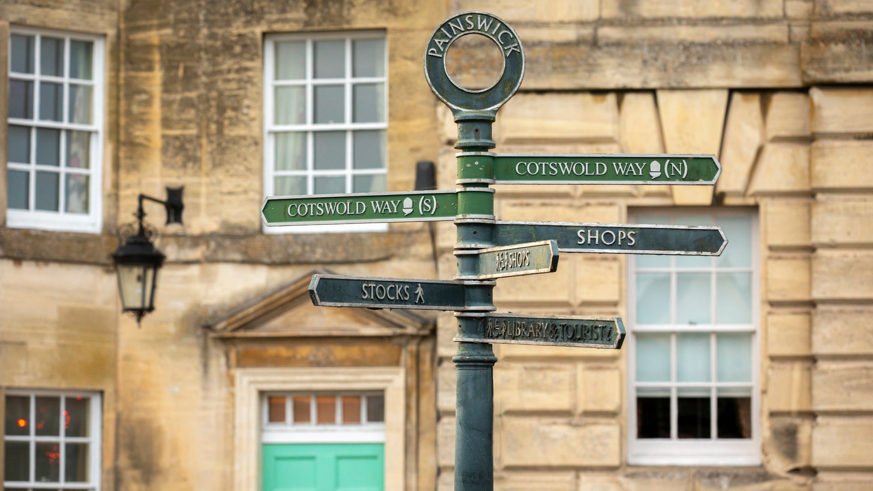 A signpost in Painswick, Gloucestershire