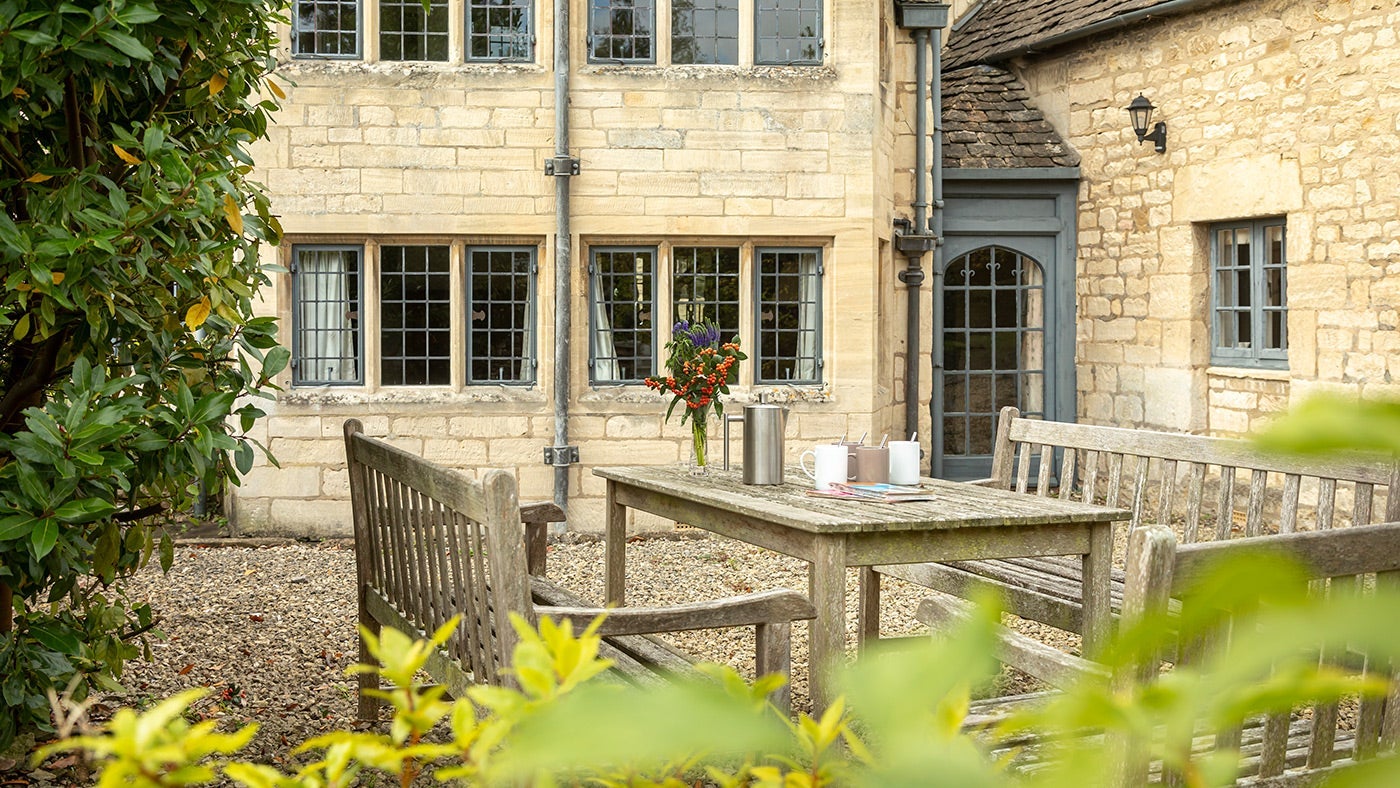 The outdoor seating and table at The Little Fleece, Gloucestershire
