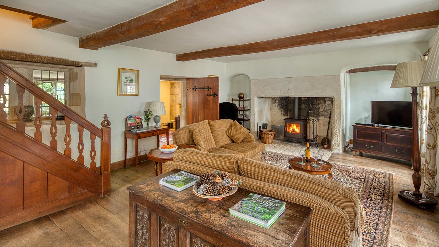 The cosy sitting room at The Little Fleece, Painswick, Gloucestershire