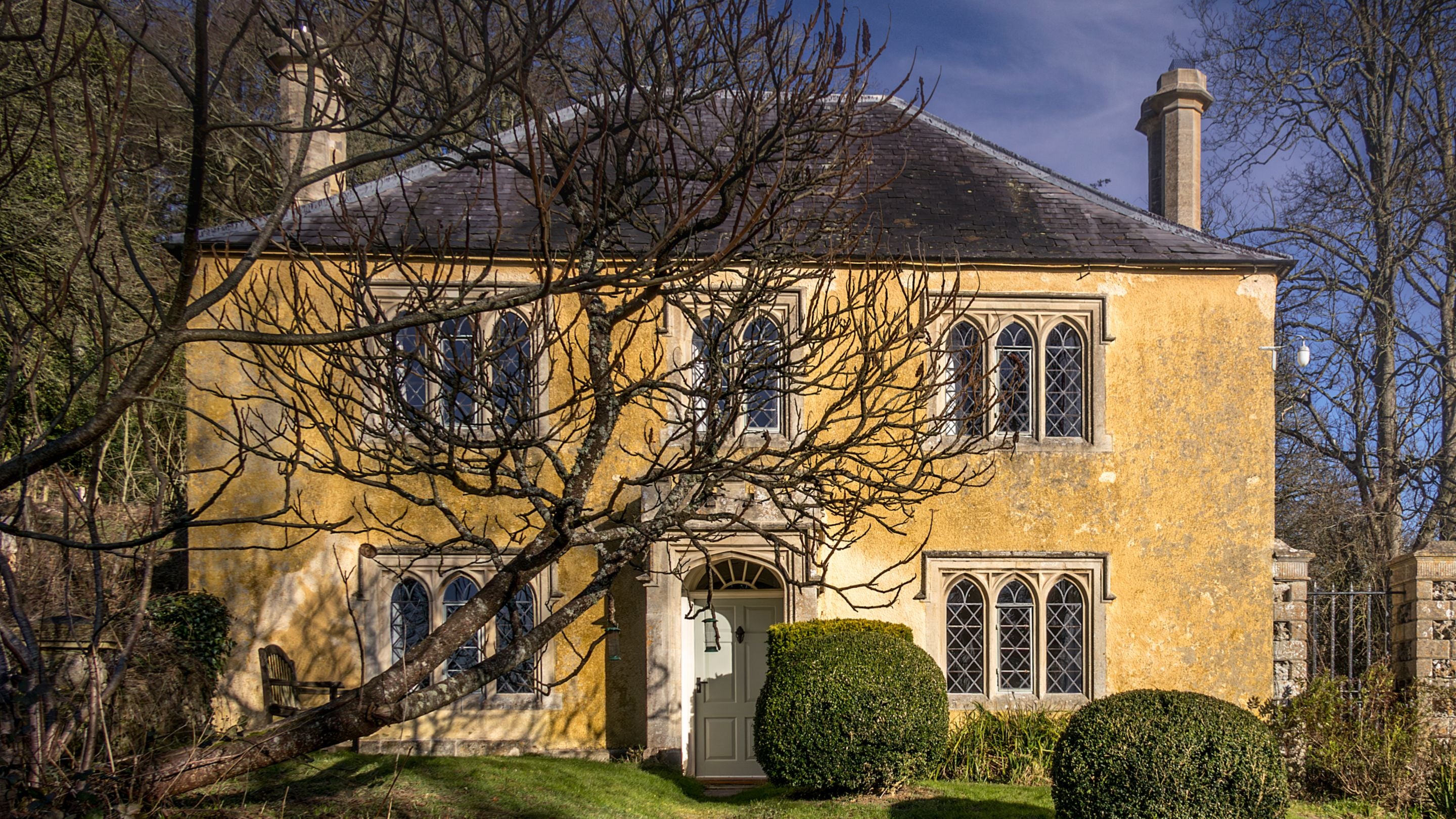 The exterior of Newark Lower Lodge in winter, Gloucestershire