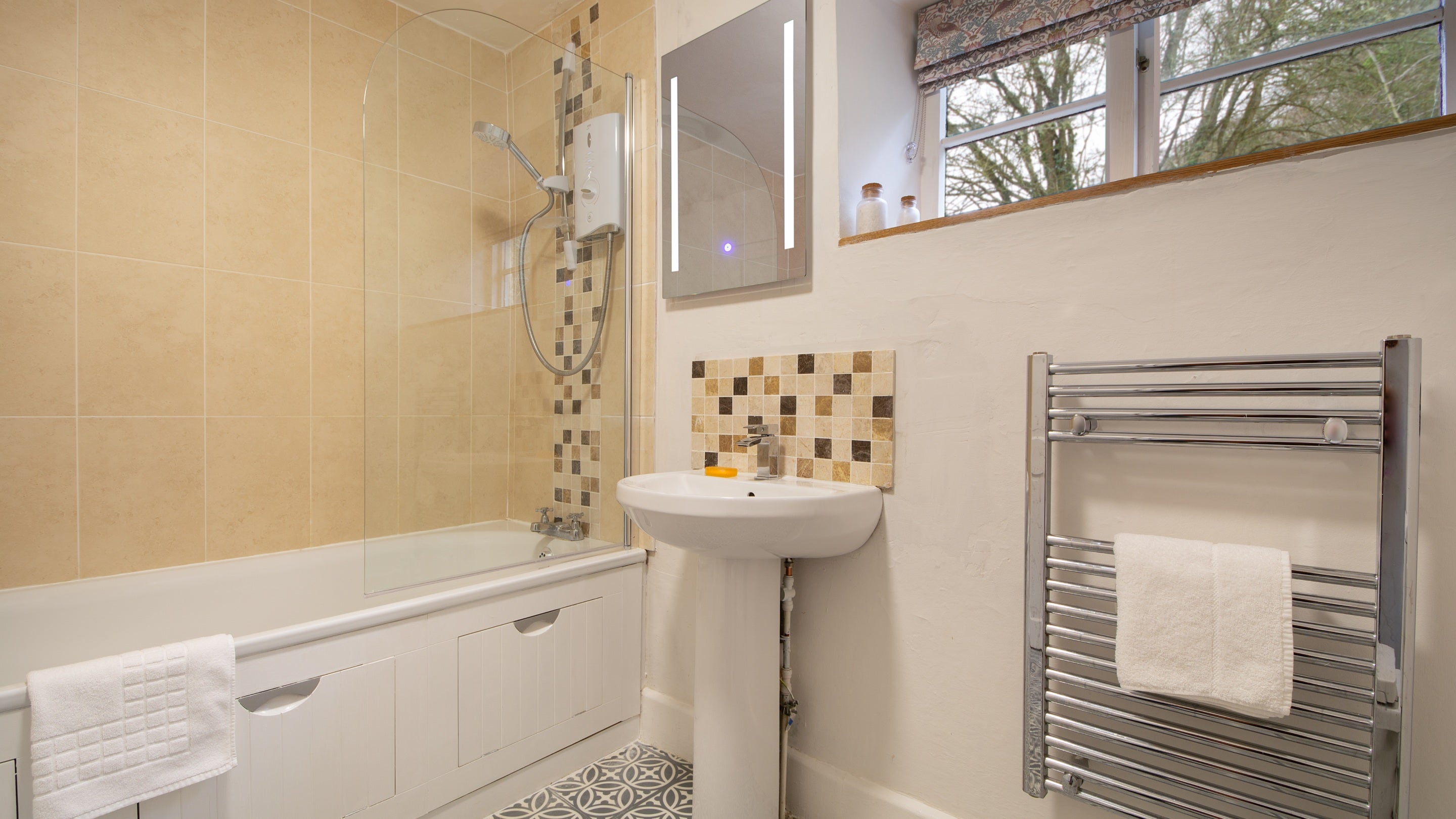 The family bathroom, with shower over bath, at Newark Lower Lodge, Gloucestershire