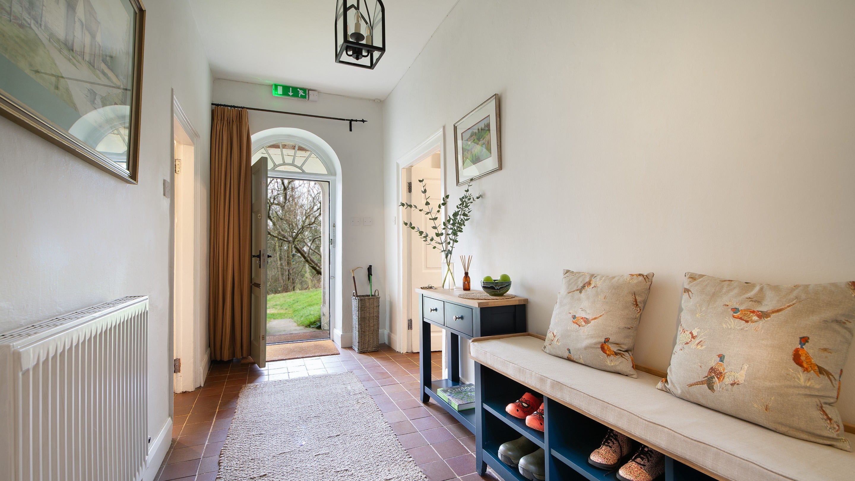 The entrance hall at Newark Lower Lodge, Gloucestershire