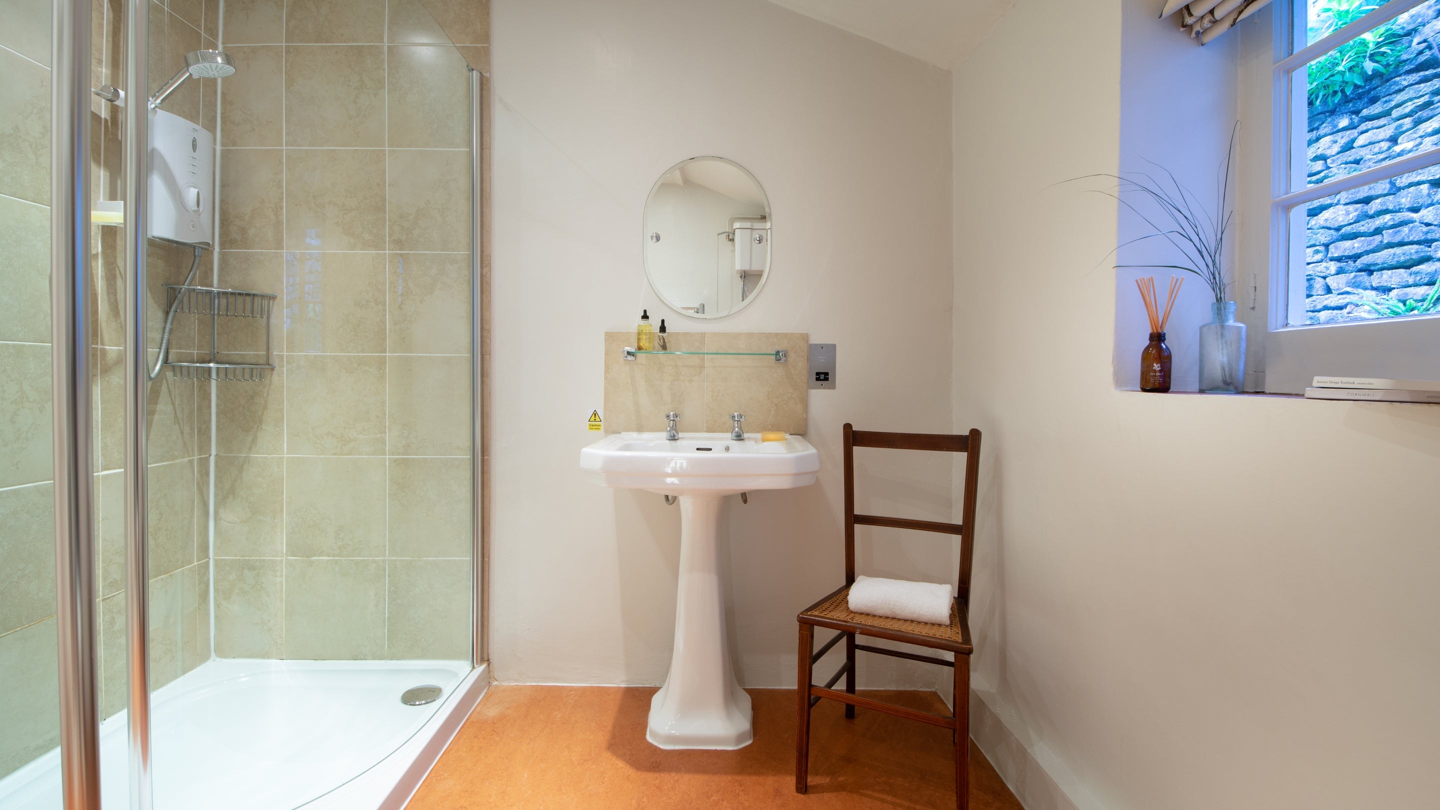 The shower room at Snowshill Manor Farmhouse, Gloucestershire
