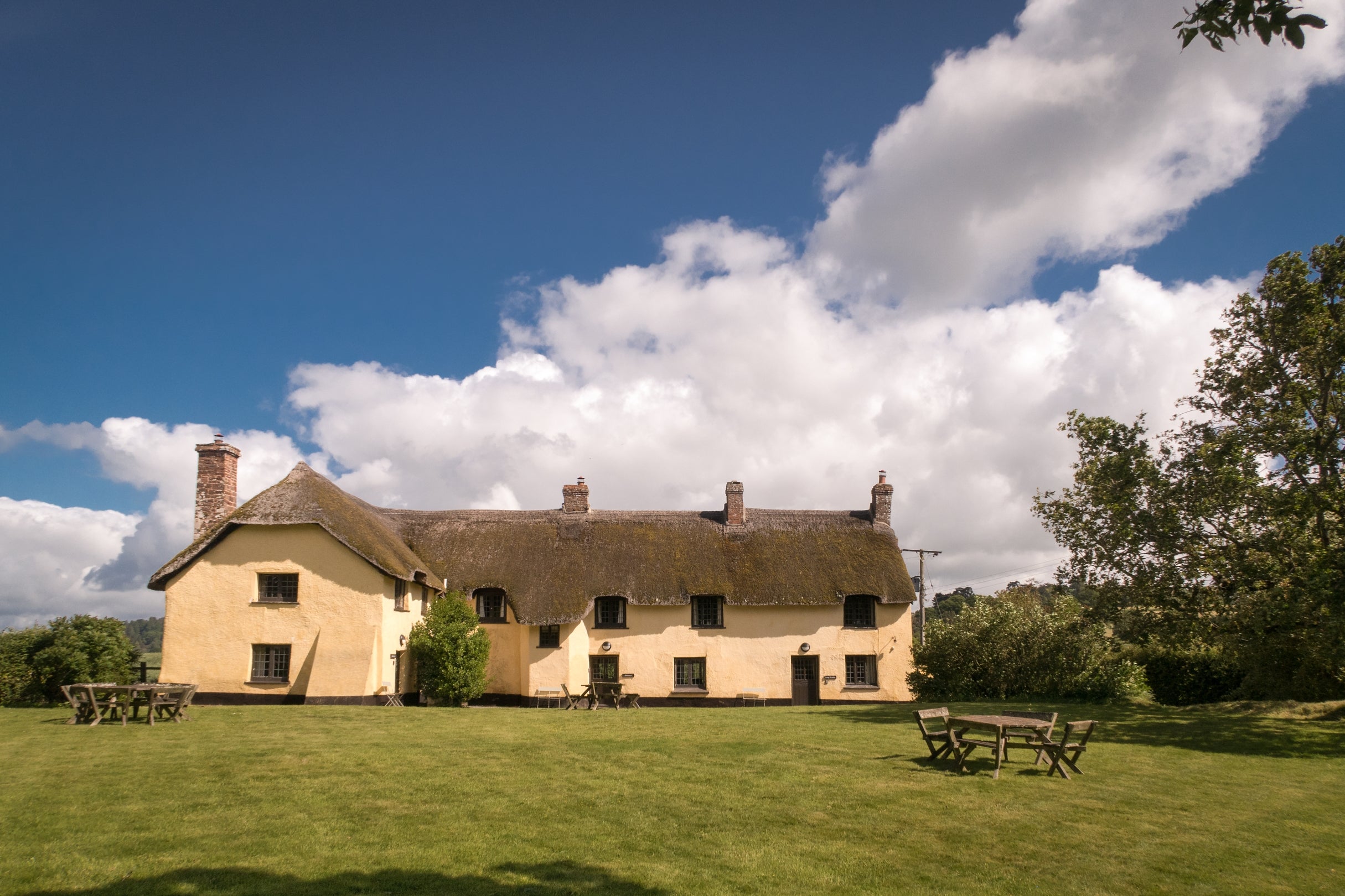 The exterior of Broad Ley Cottage, Longmeadow Cottage and Mattress Cottage, Broadclyst, Devon