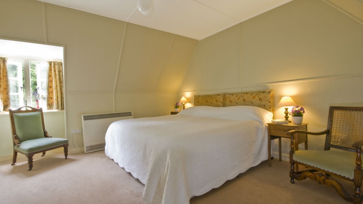 The light and airy bedroom at The Chauffeur's Flat, Coleton Fishacre, Devon