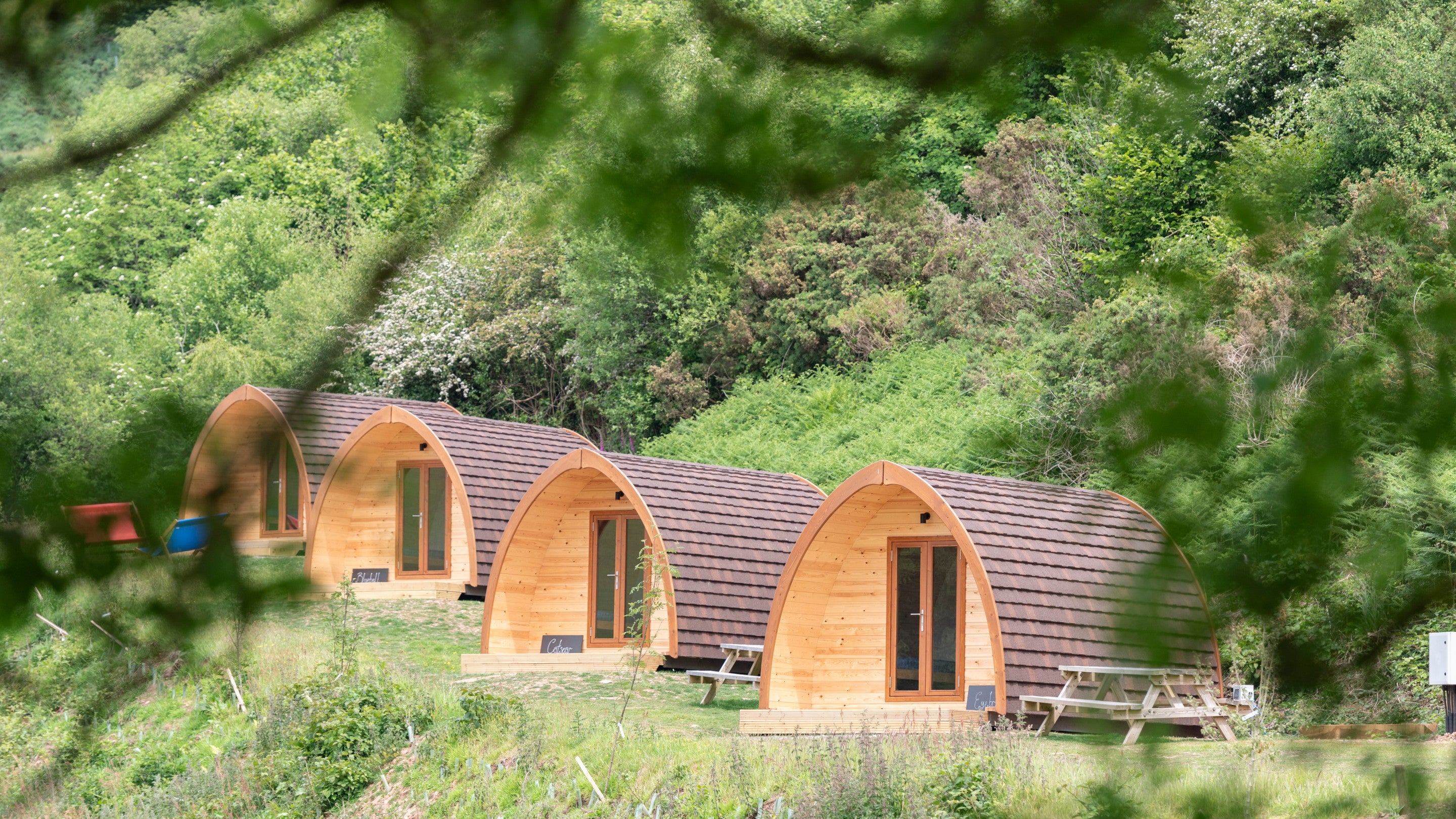 The row of pods at Cloud Farm Campsite, Devon