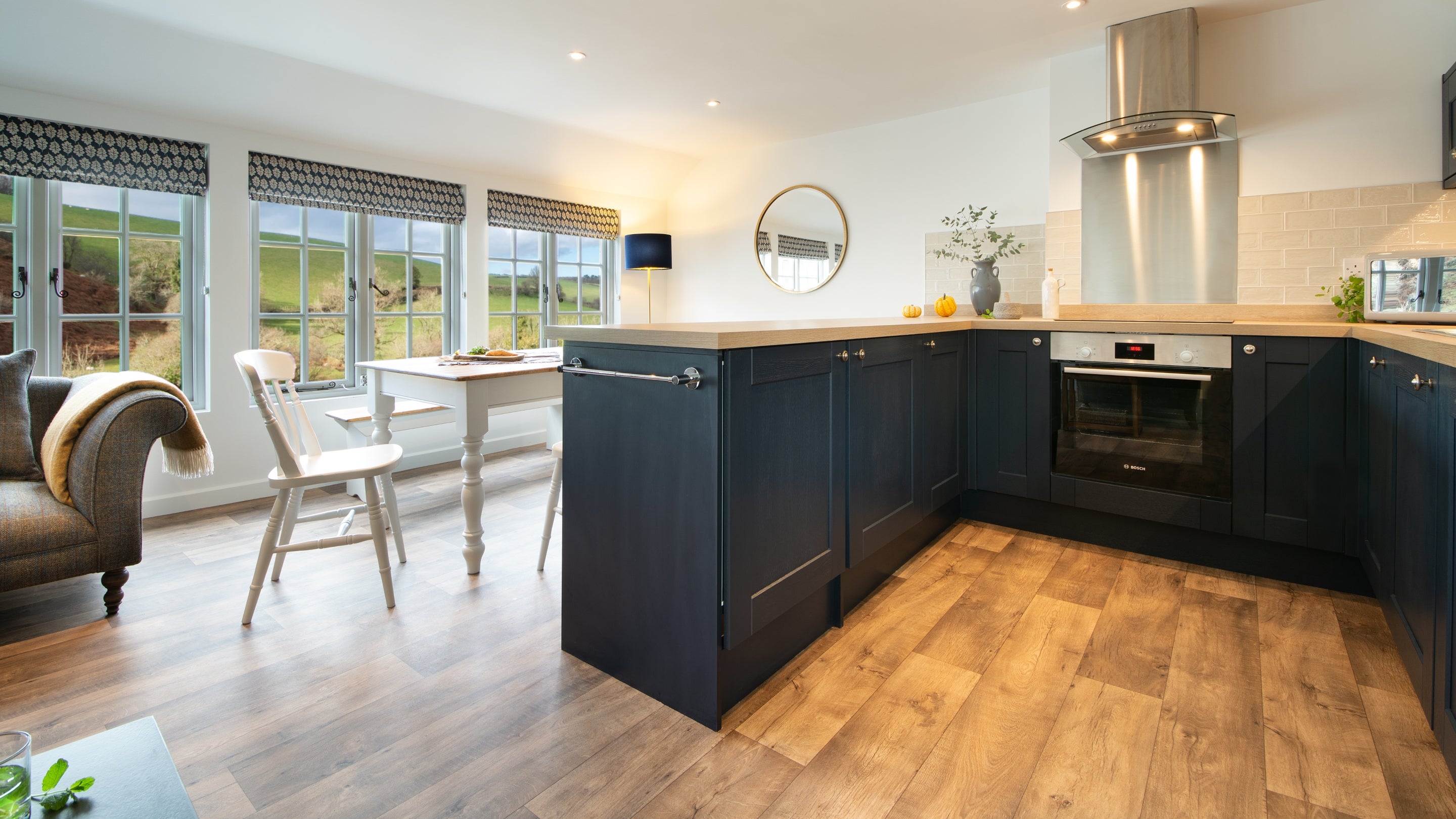 The open-plan kitchen, sitting and dining room at Cloud Farmhouse, Devon