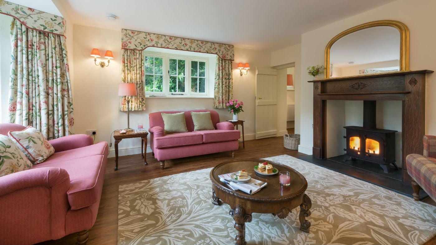 The cosy sitting room at Combe Park Lodge, Lynton, Devon