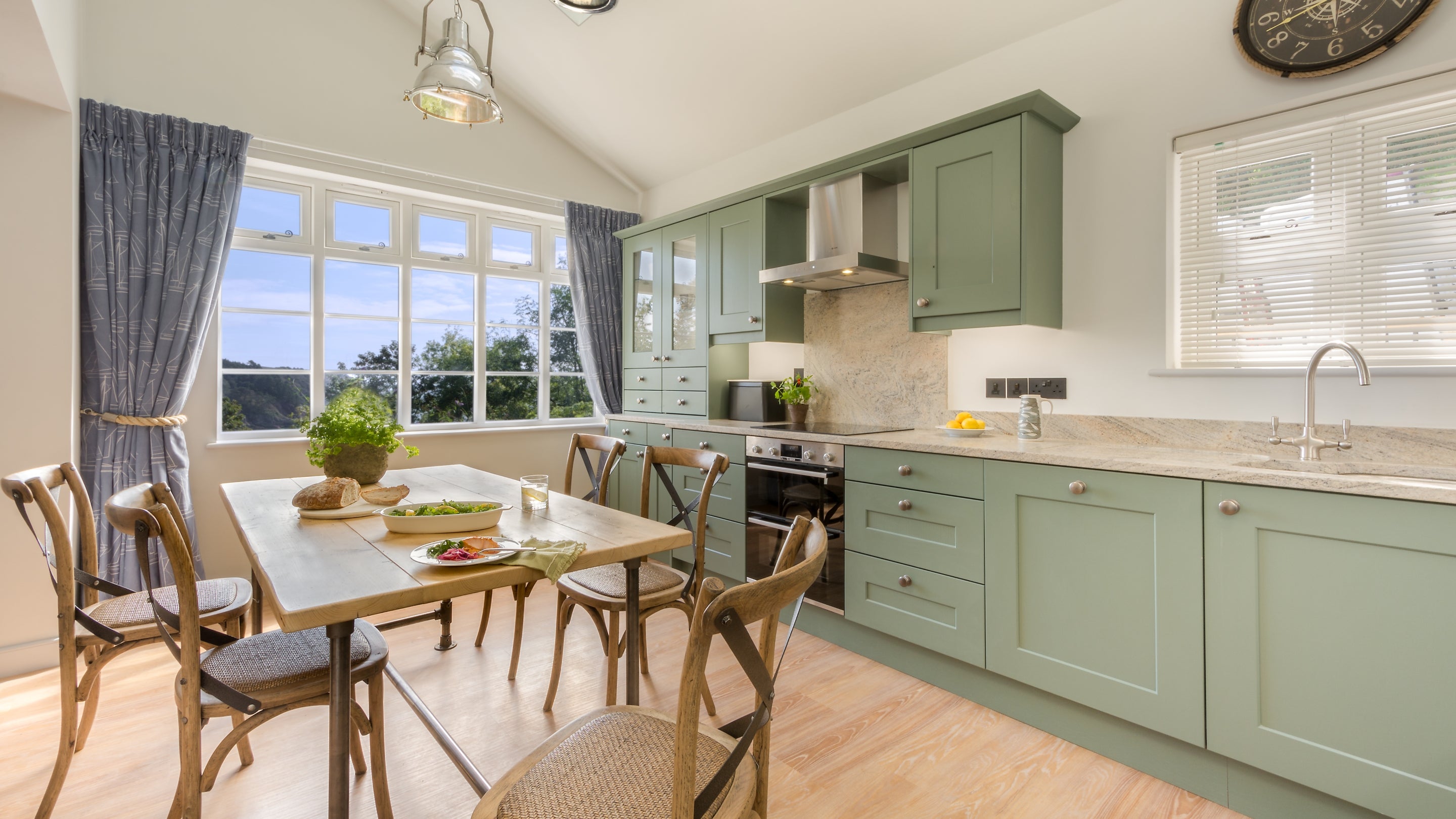 The open-plan kitchen and dining room at Compass Cottage, Devon