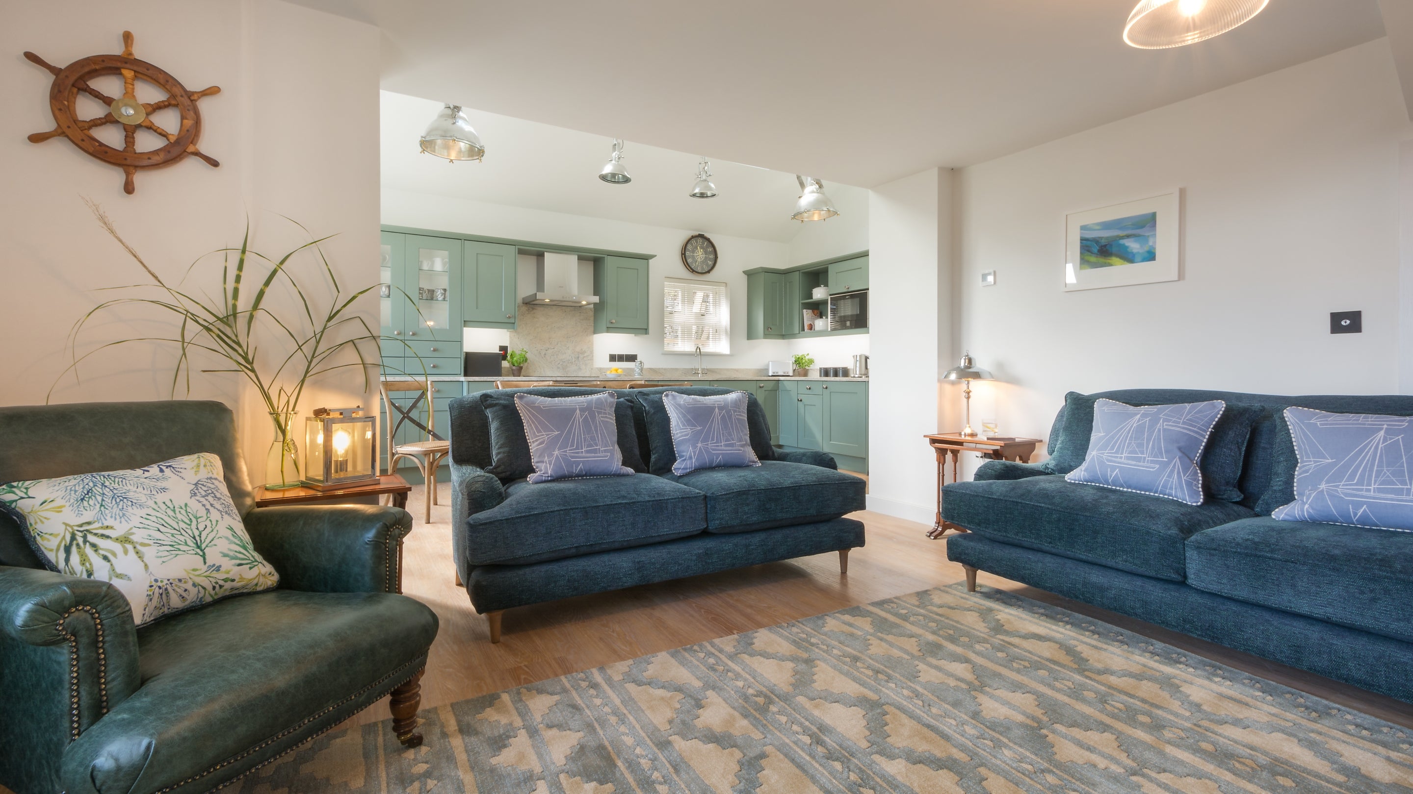 The open-plan kitchen, dining and sitting room at Compass Cottage, Devon