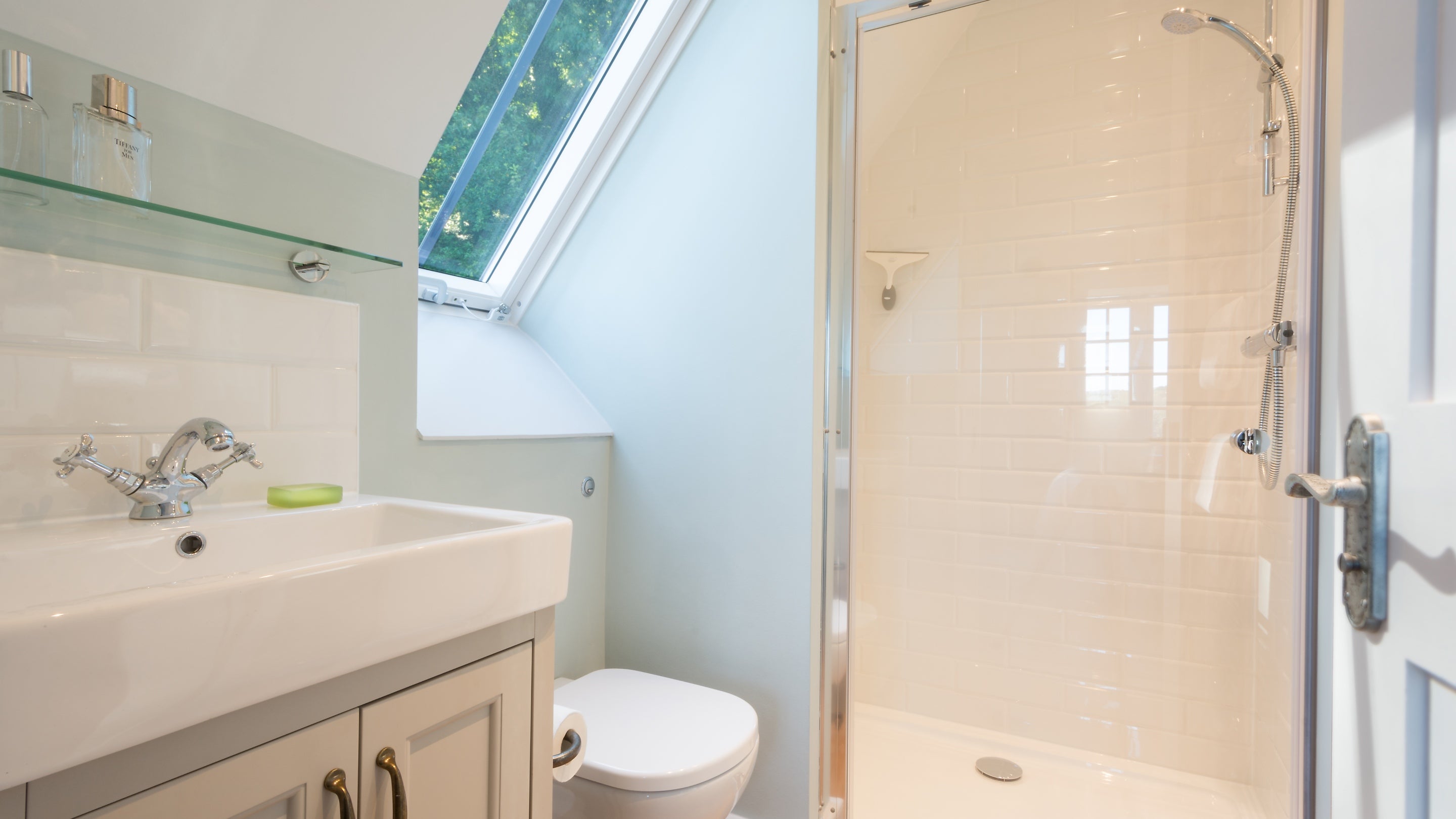 The en-suite shower room on the second floor of Compass Cottage, Devon