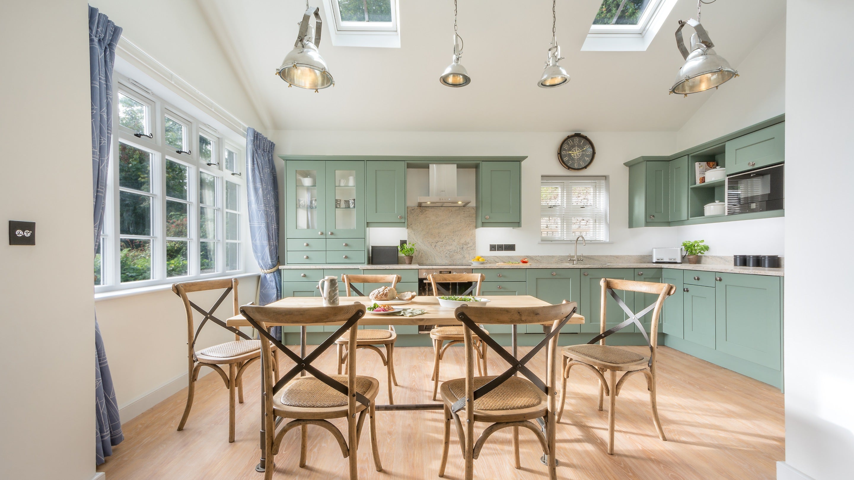 The open-plan kitchen and dining room at Compass Cottage, Devon