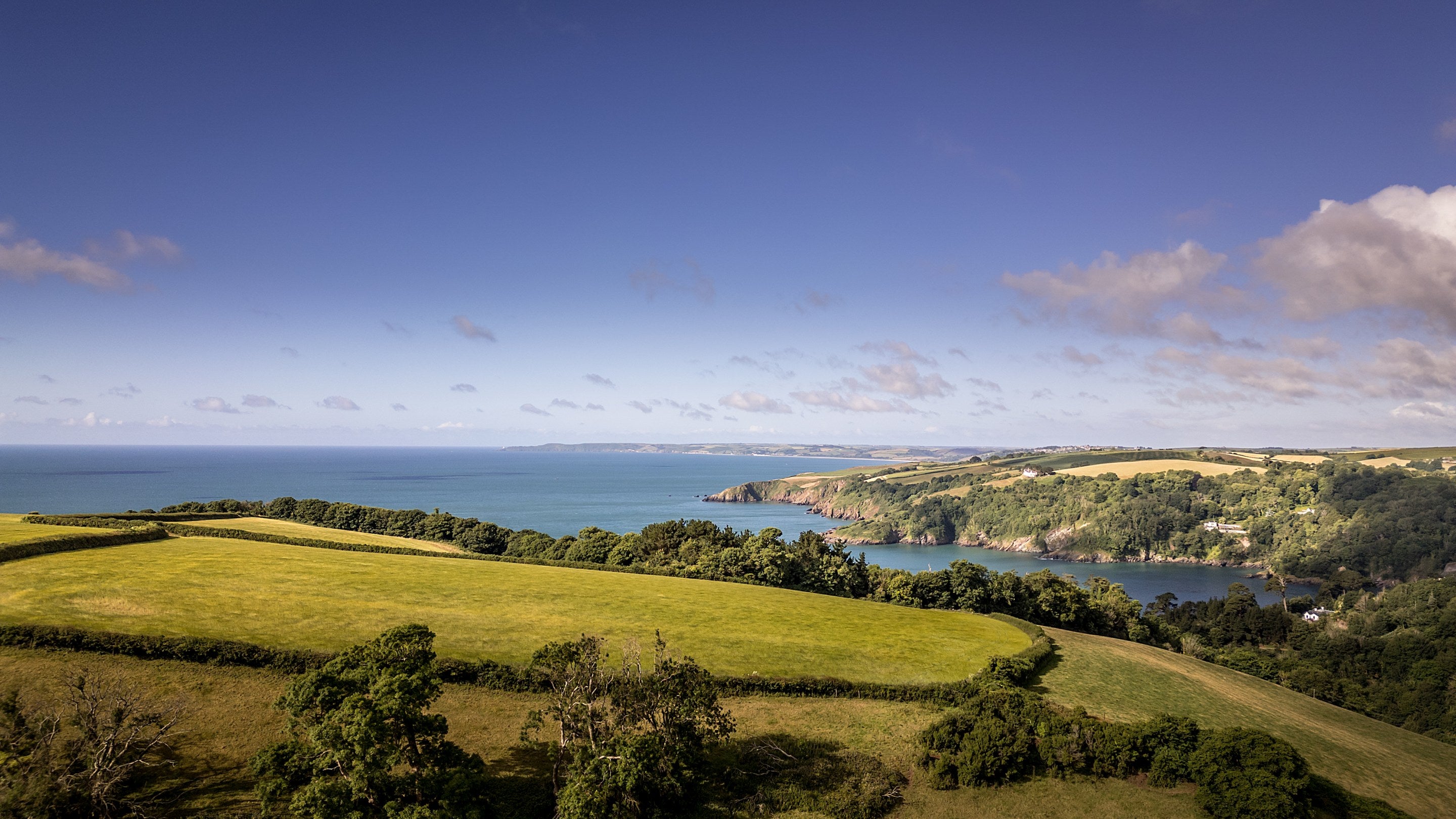 The cliffs and fields along the coast near Crockers Cottage, Devon