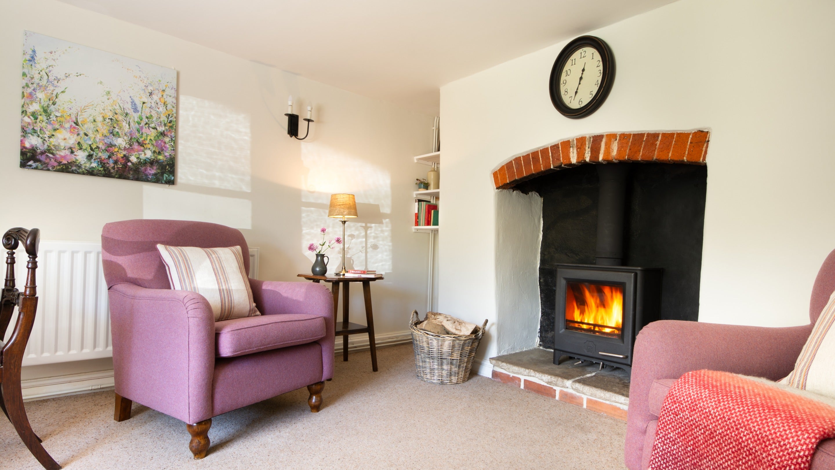 The sitting area with woodburner at Crockers Cottage, Devon