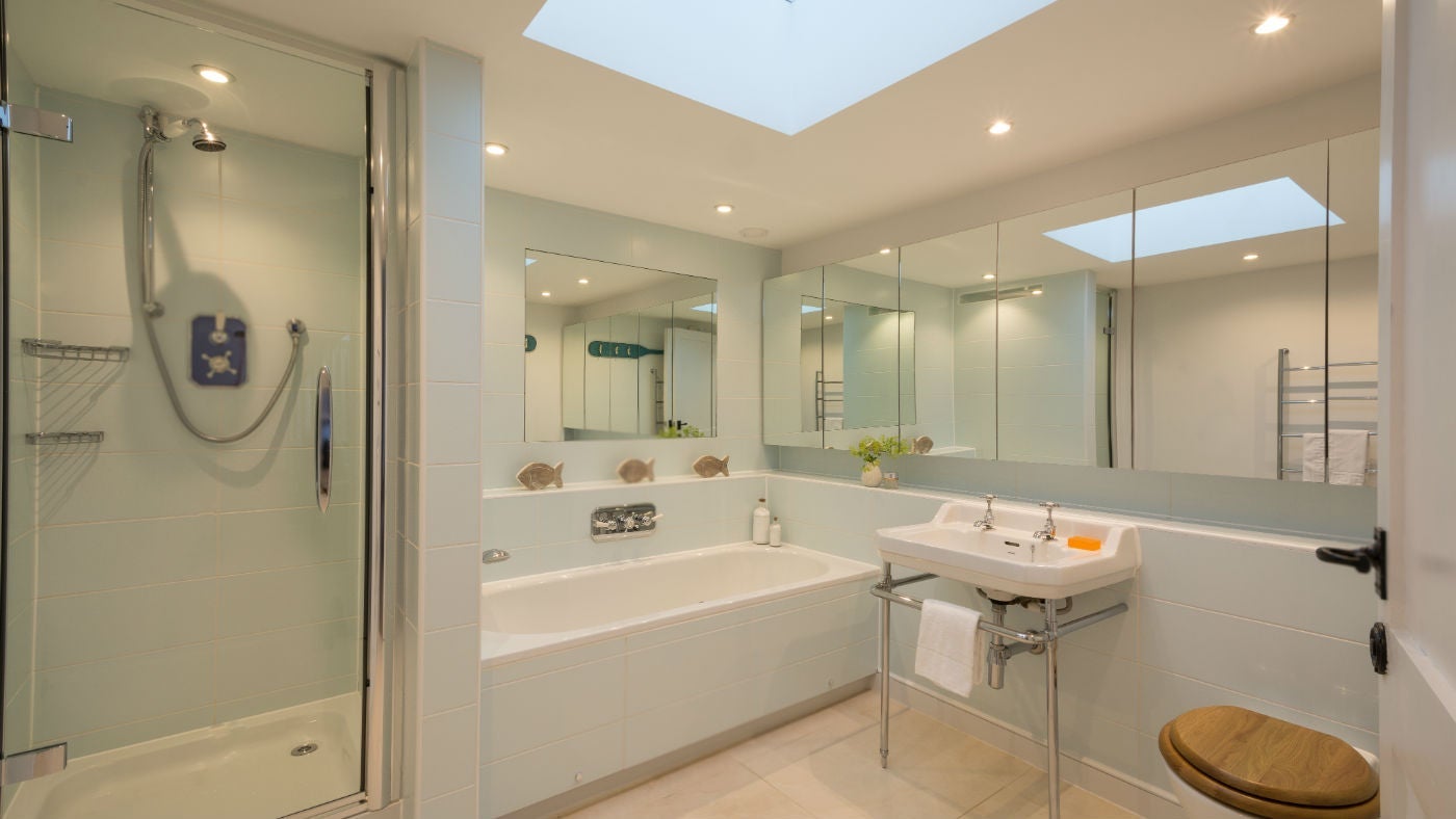 The bright and airy downstairs bathroom at Ferry Cottage, Brixham, Devon