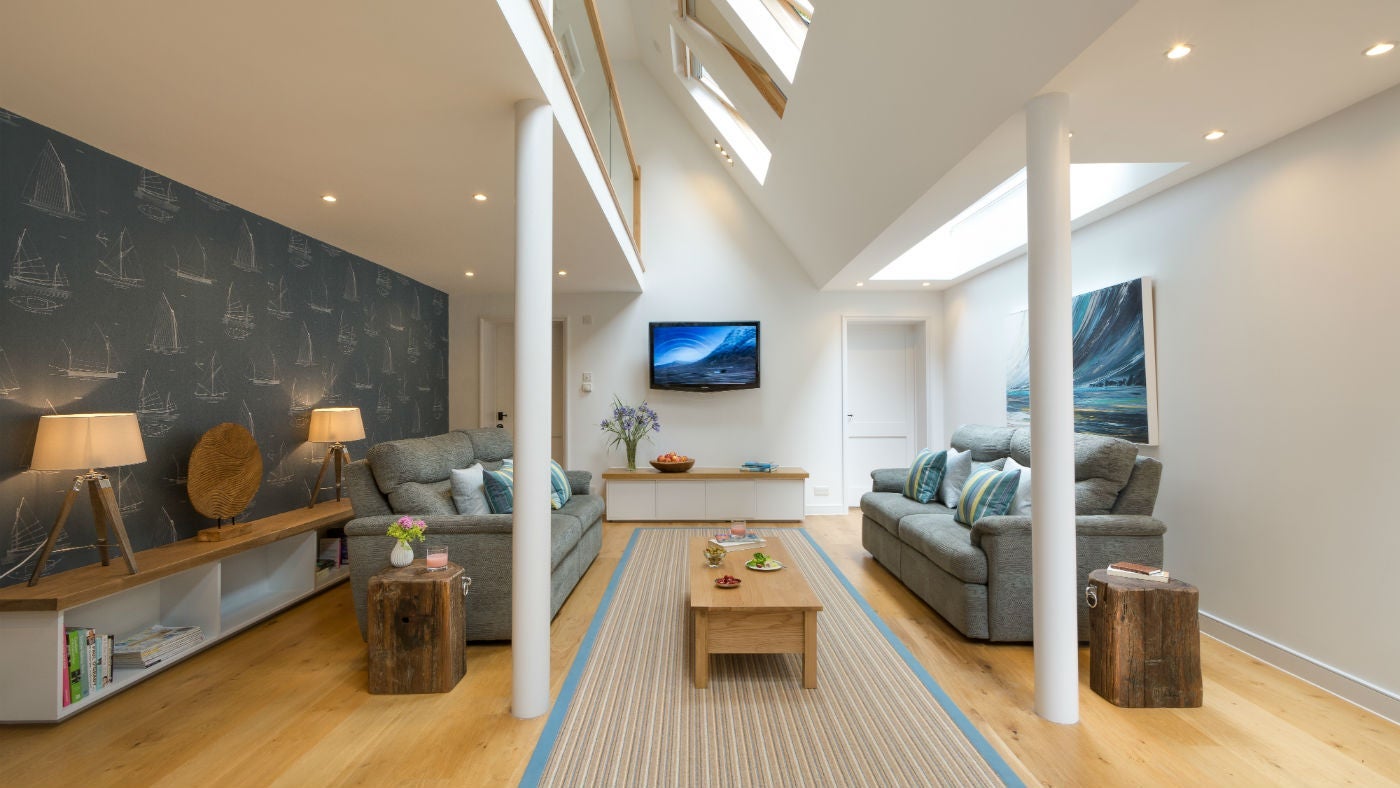 The spacious open plan sitting dining area at Ferry Cottage, Brixham, Devon
