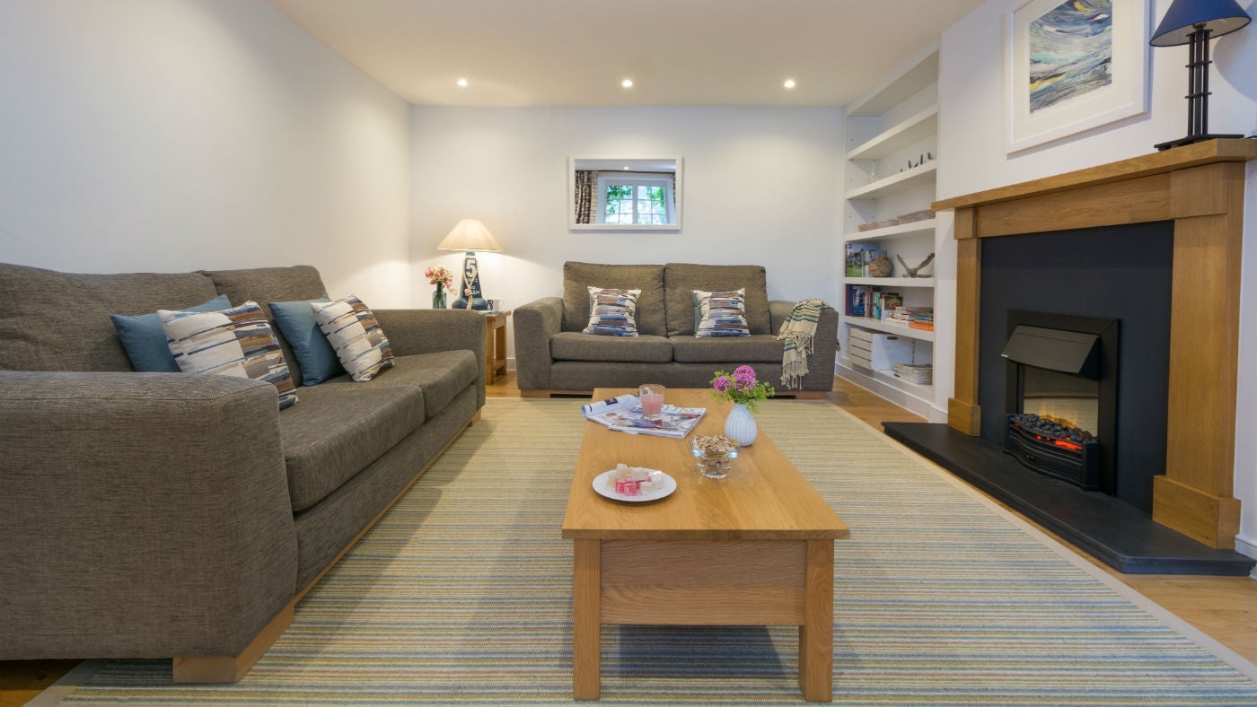 The cosy sitting room at Ferry Cottage, Brixham, Devon