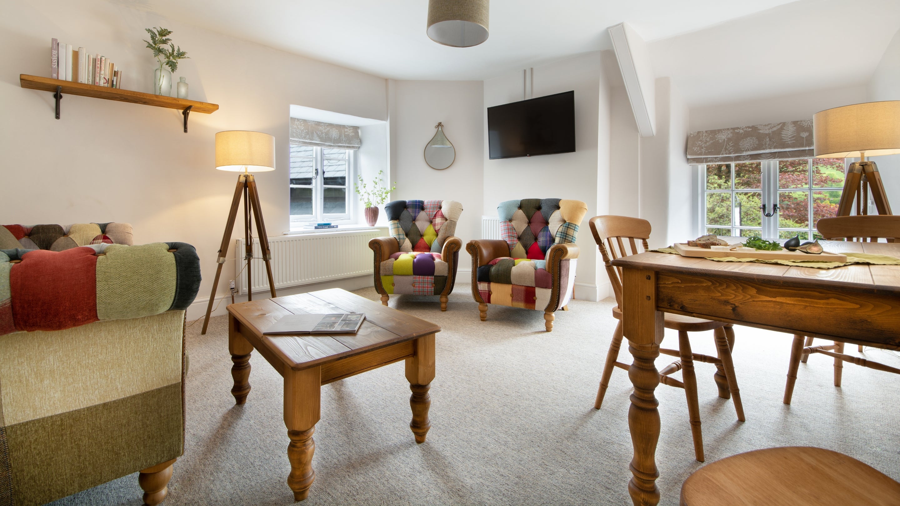 The sitting and dining room at Heron View, Devon