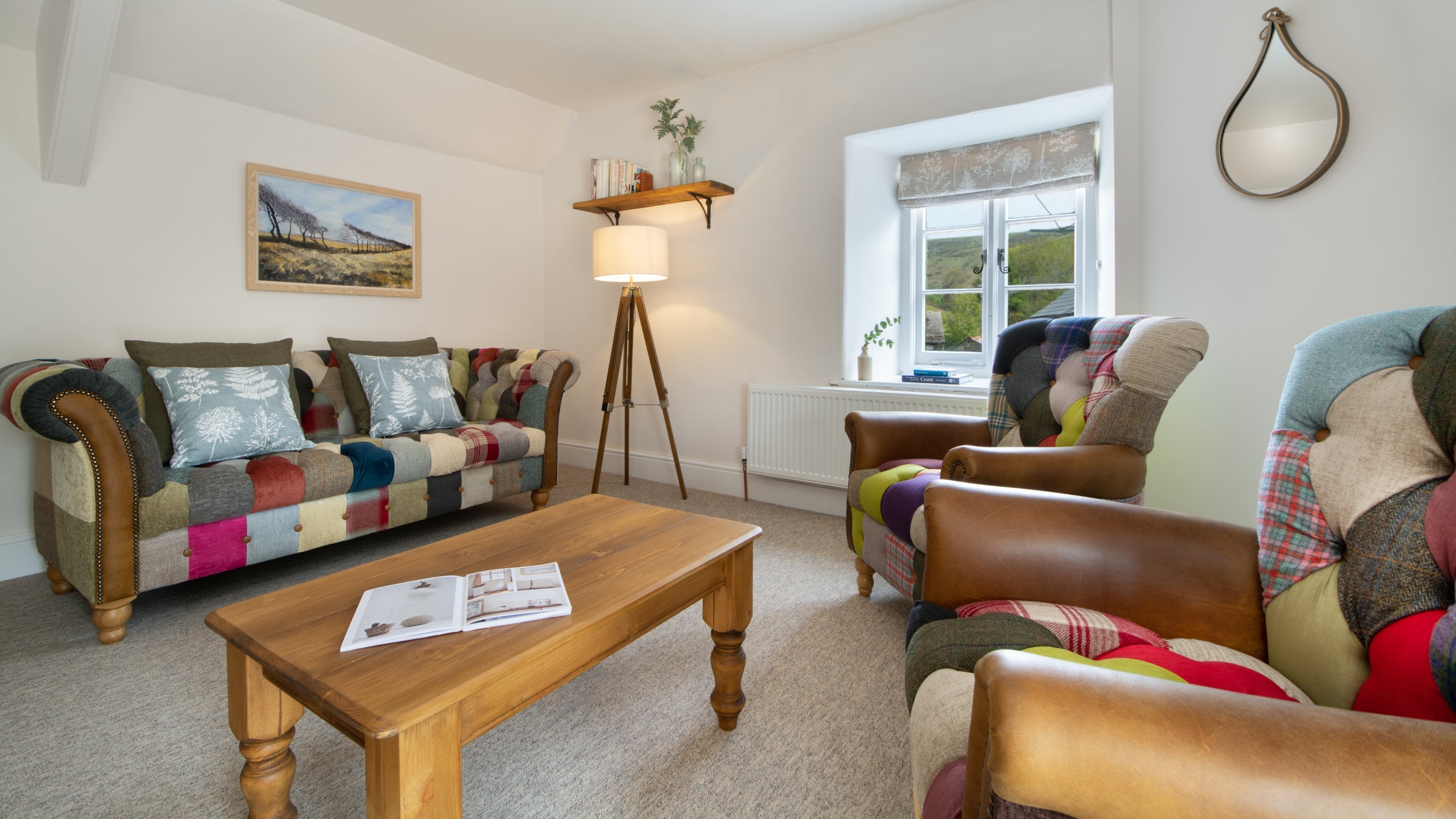 The sitting and dining room at Heron View, Devon