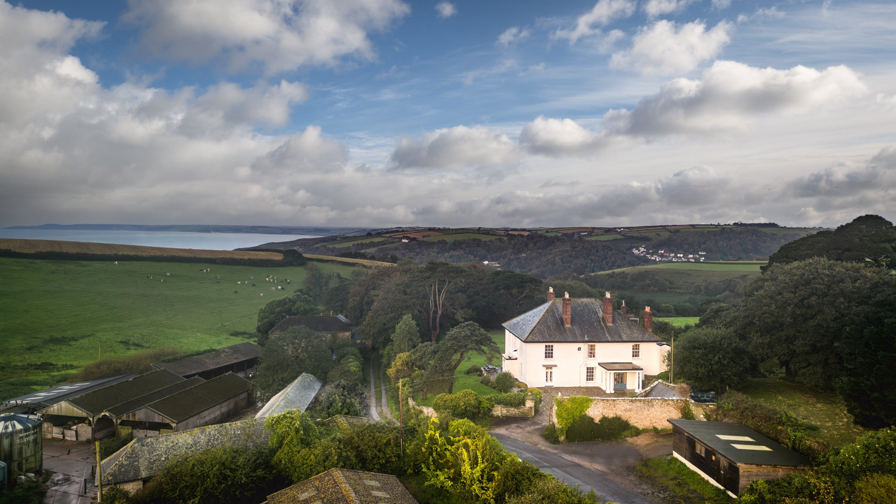 The exterior and surrounding area of Higher Brownstone Farm, Devon