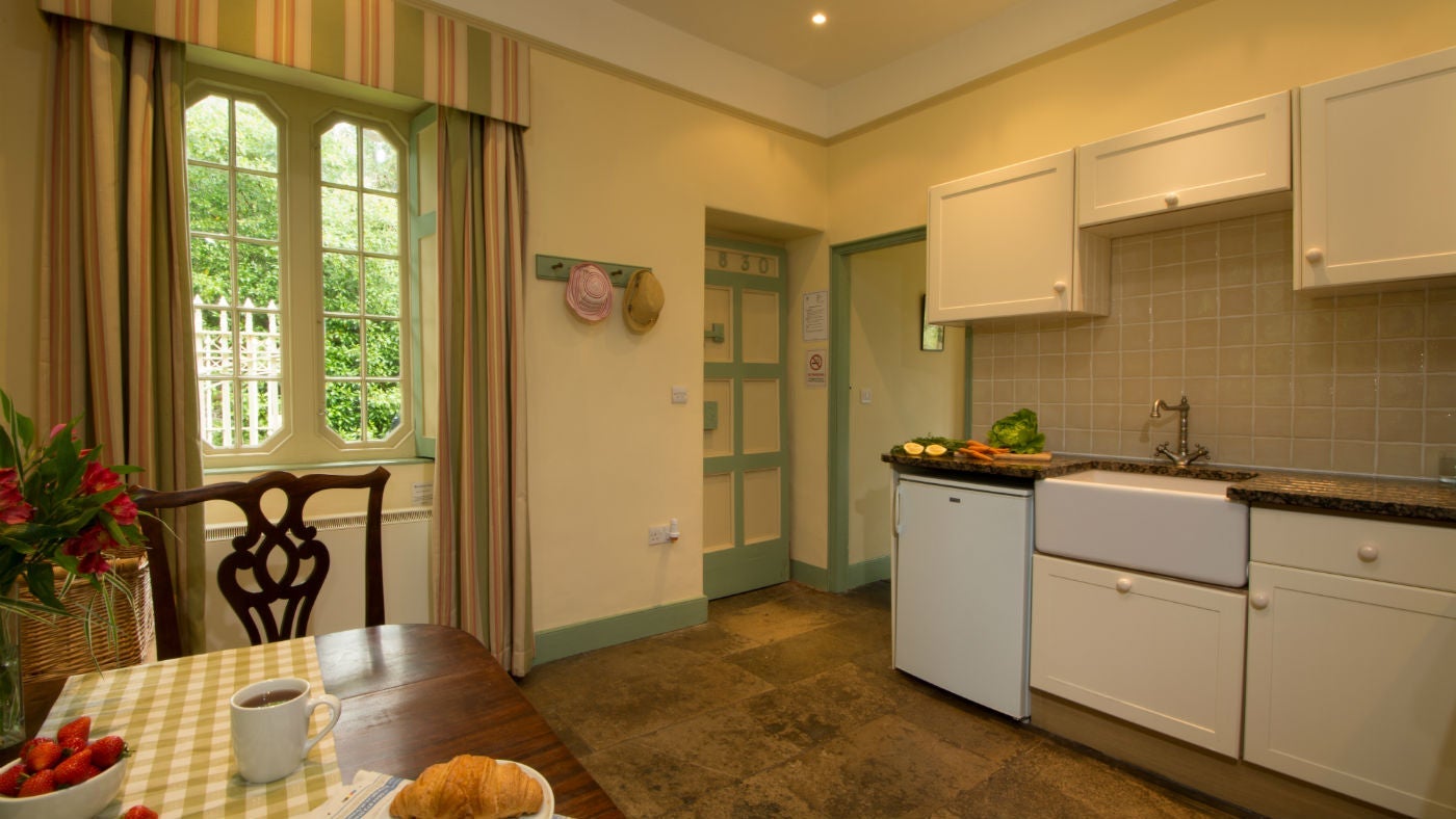 The bright kitchen dining room at The Lodge at Greenway, Devon