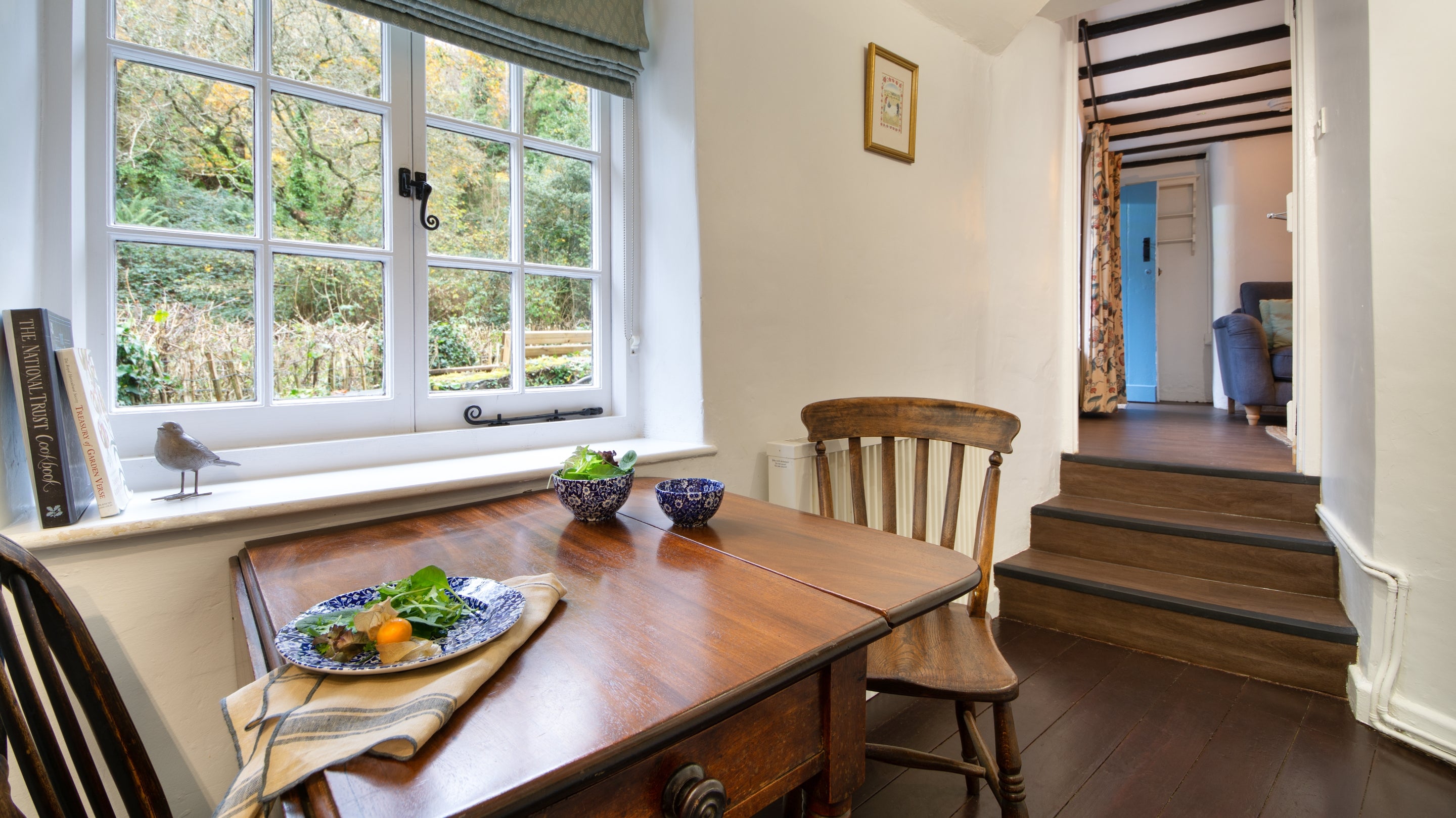 The kitchen dining area at Peppercombe Coastguard Cottage 3, Devon