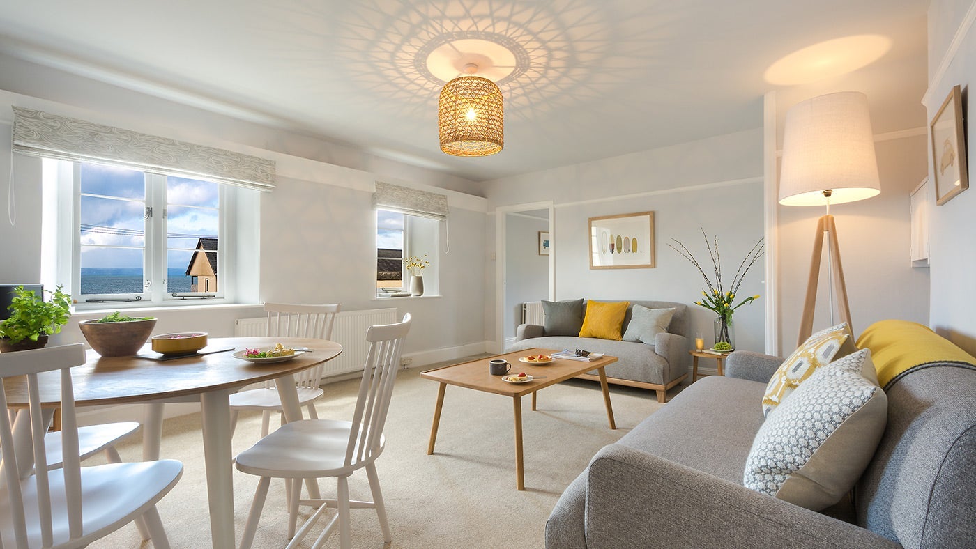 The sitting and dining room at The Slipway, Croyde, Devon