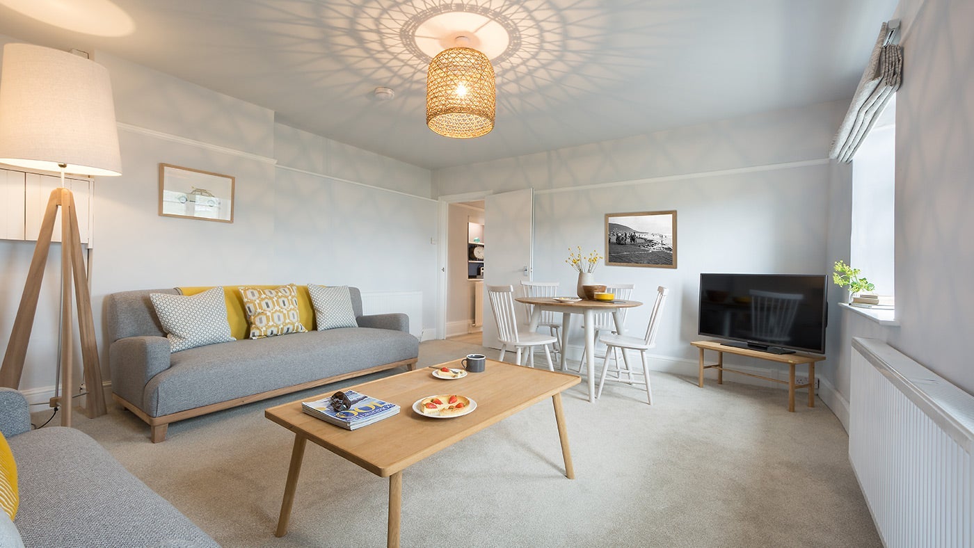 The sitting and dining room at The Slipway, Croyde, Devon