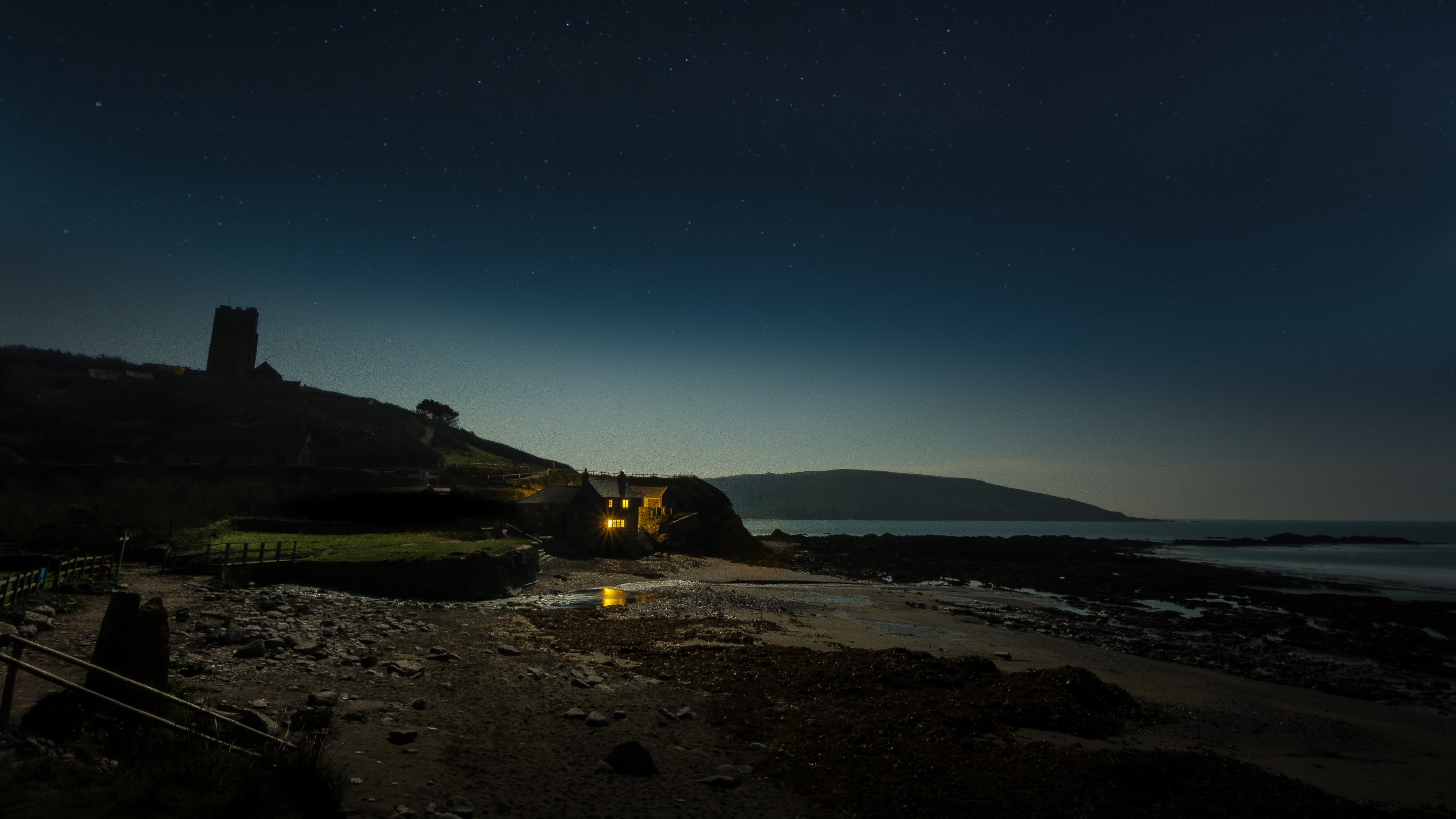 Exterior at night of The Mill Cottage, Plymouth