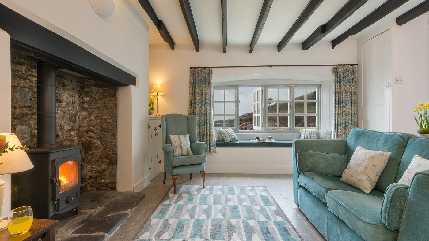 The sitting/dining room at The Mill Cottage, Devon