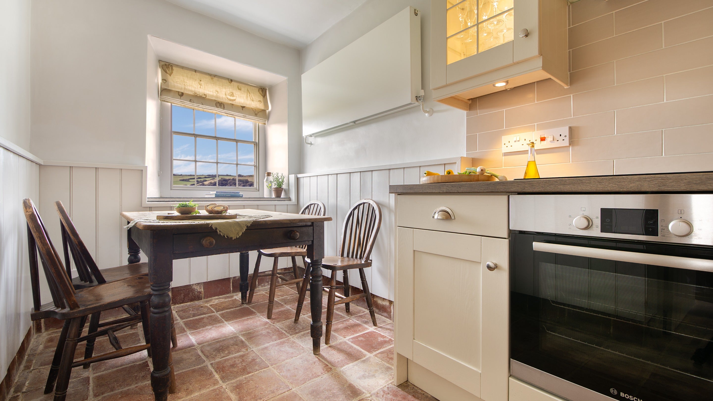 The open-plan kitchen and dining room at West Challacombe Cottage, Devon