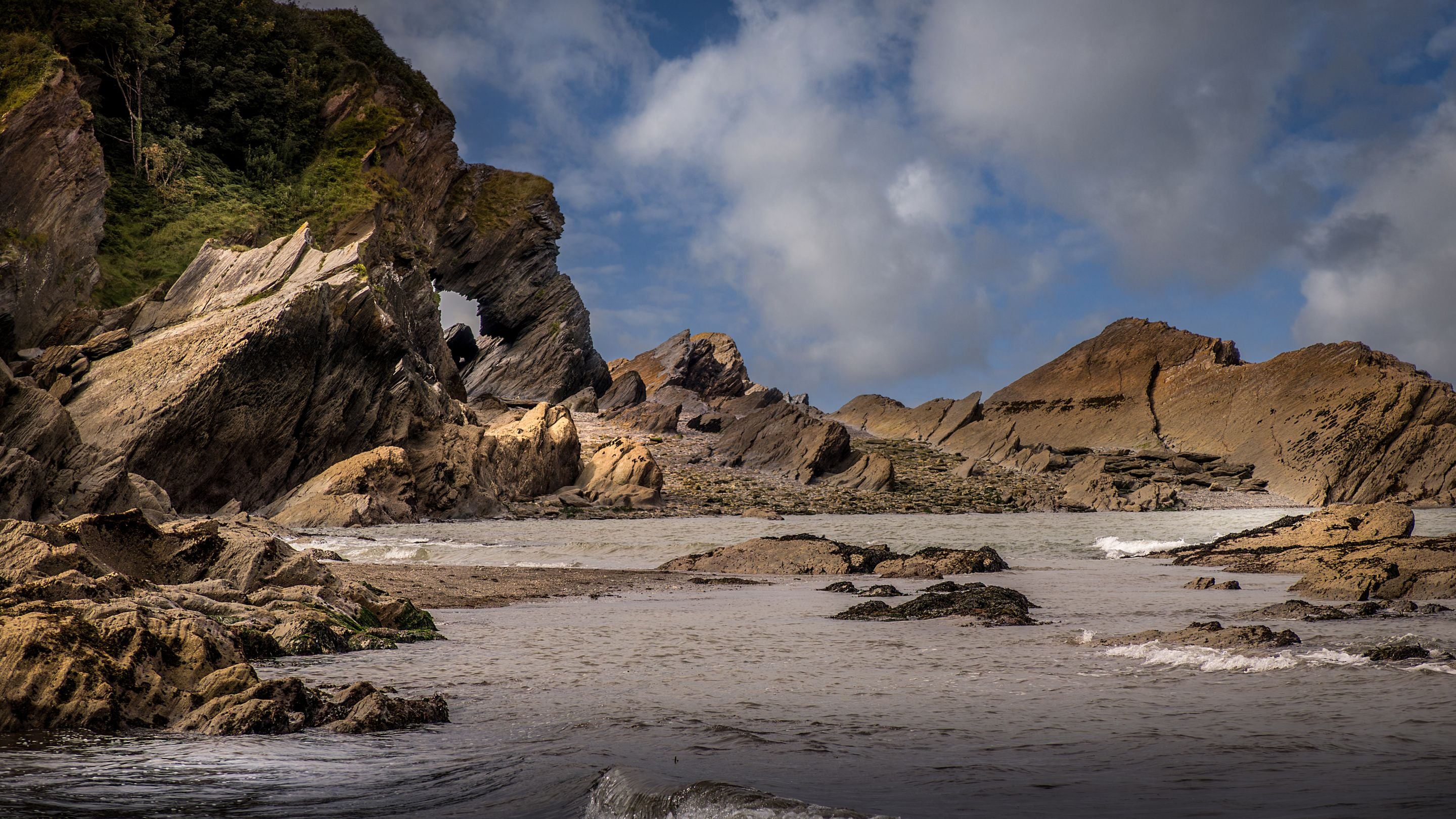 The rocky coast at Hele Bay, near West Challacombe Manor and Cottage, Devon