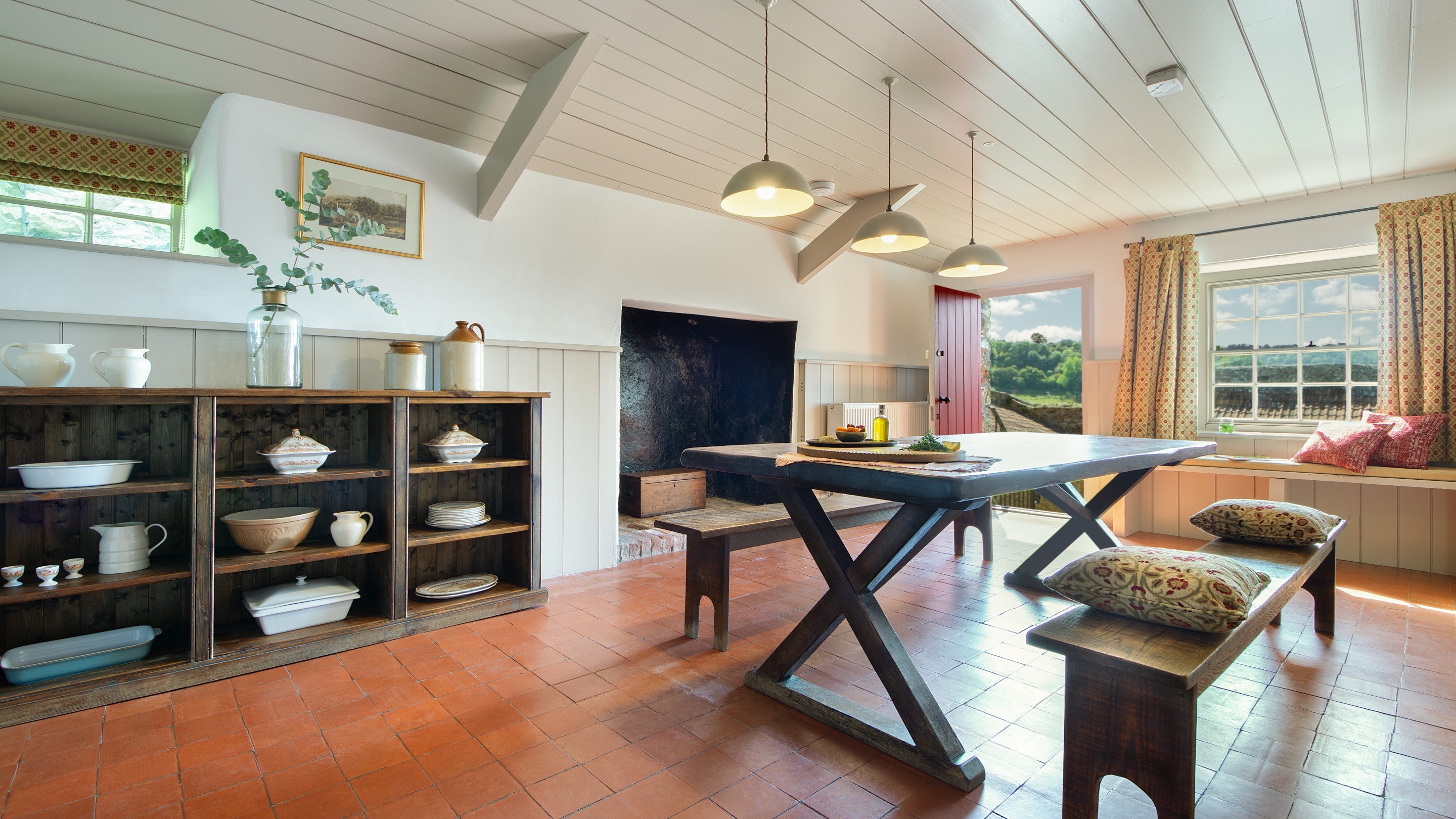 The dining room and main entrance at West Challacombe Manor, Devon
