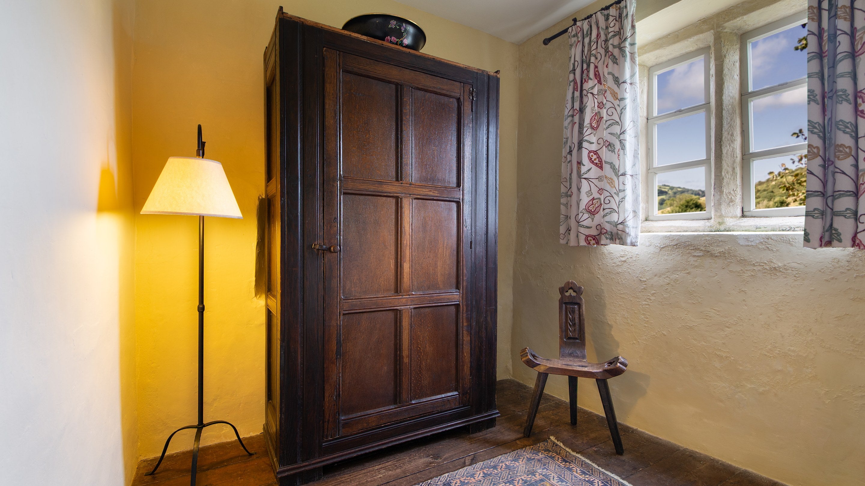 The double bedroom's dressing room with wardrobe at West Challacombe Manor, Devon