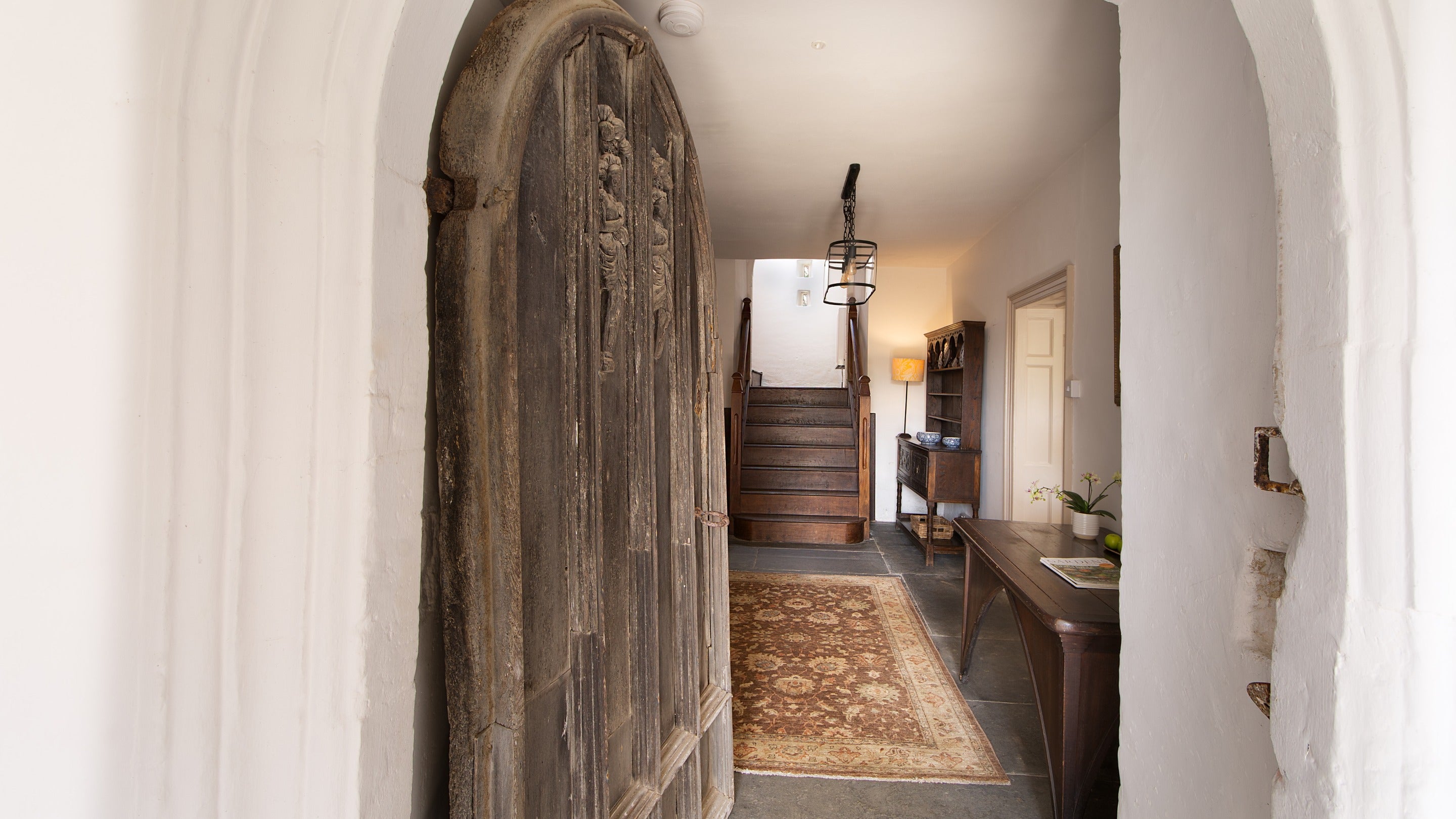 The original oak door leading into the hallway at West Challacombe Manor, Devon
