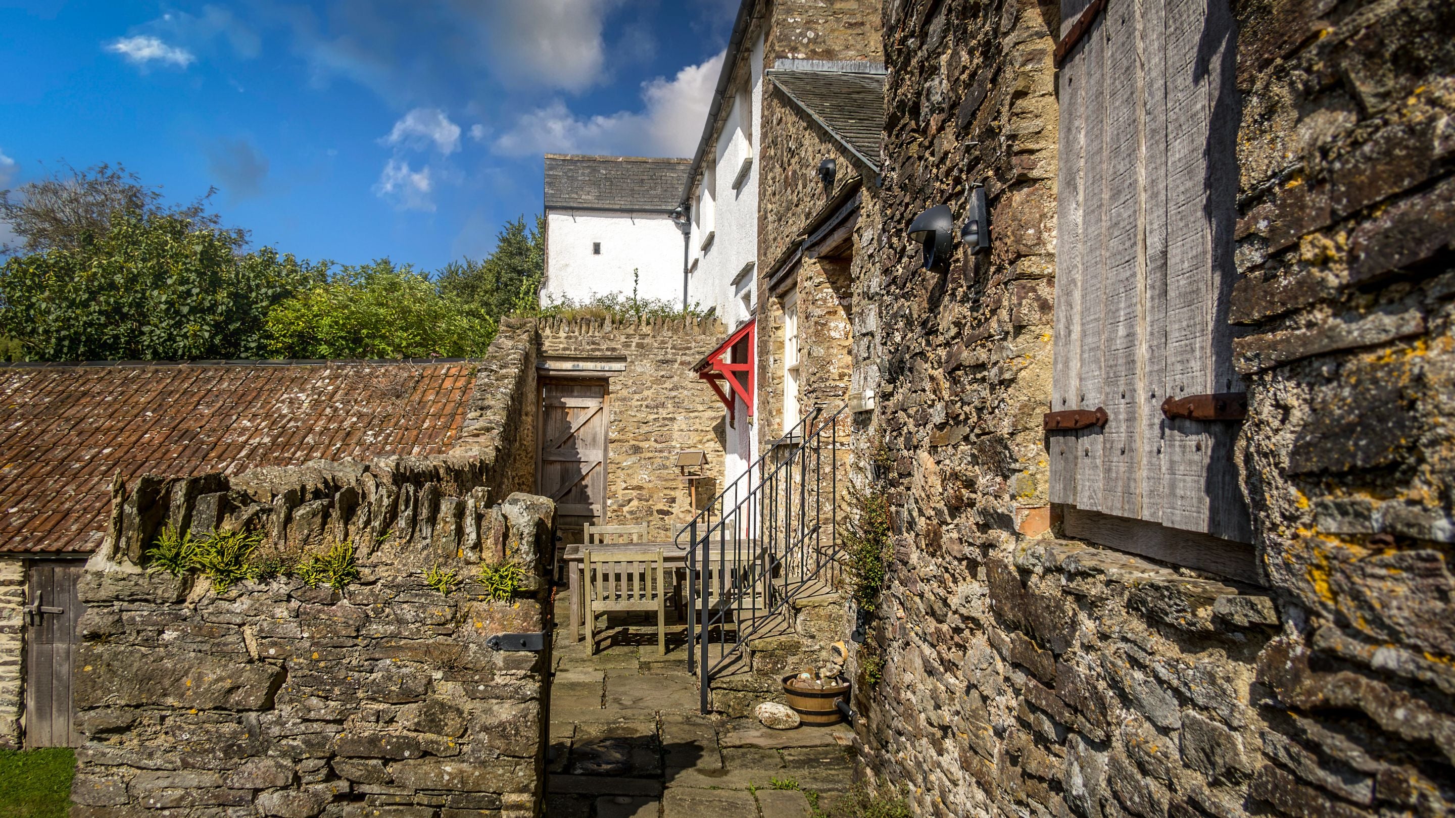 The terrace and main entrance at West Challacombe Manor, Devon