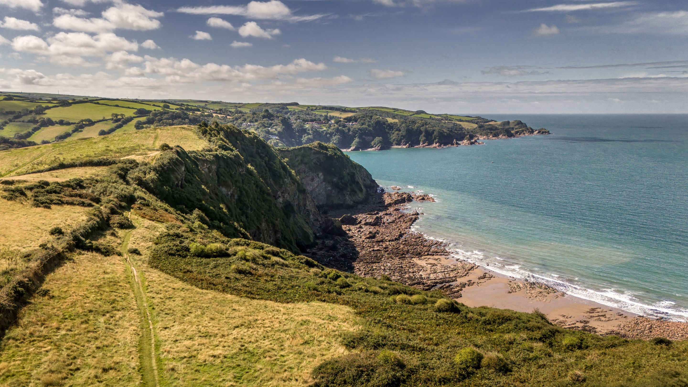 An aerial view of Wild Pear Beach, near West Challacombe Manor and Cottage, Devon