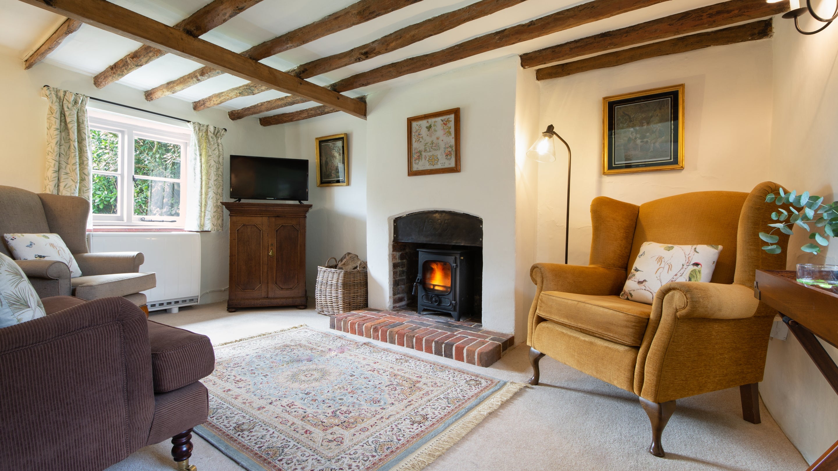 The sitting room at 524 Pamphill Green, Dorset
