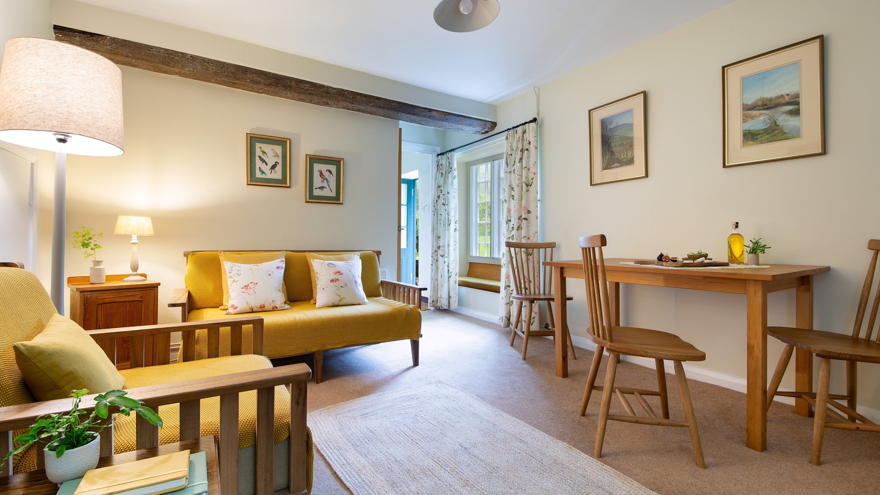 The open-plan sitting and dining room at Ash Cottage, Dorset