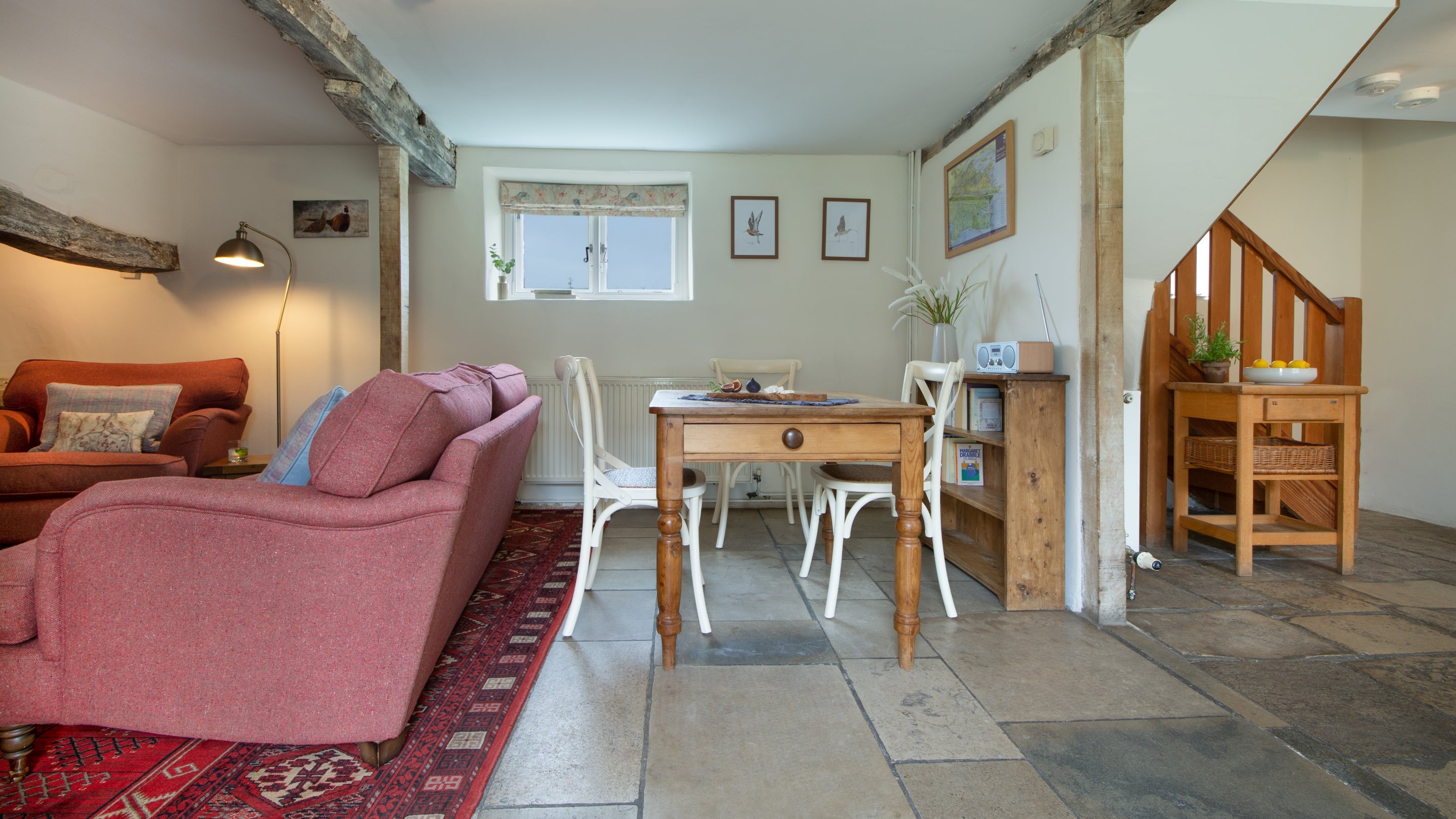 The sitting room and dining area at The Bakehouse, Dorset