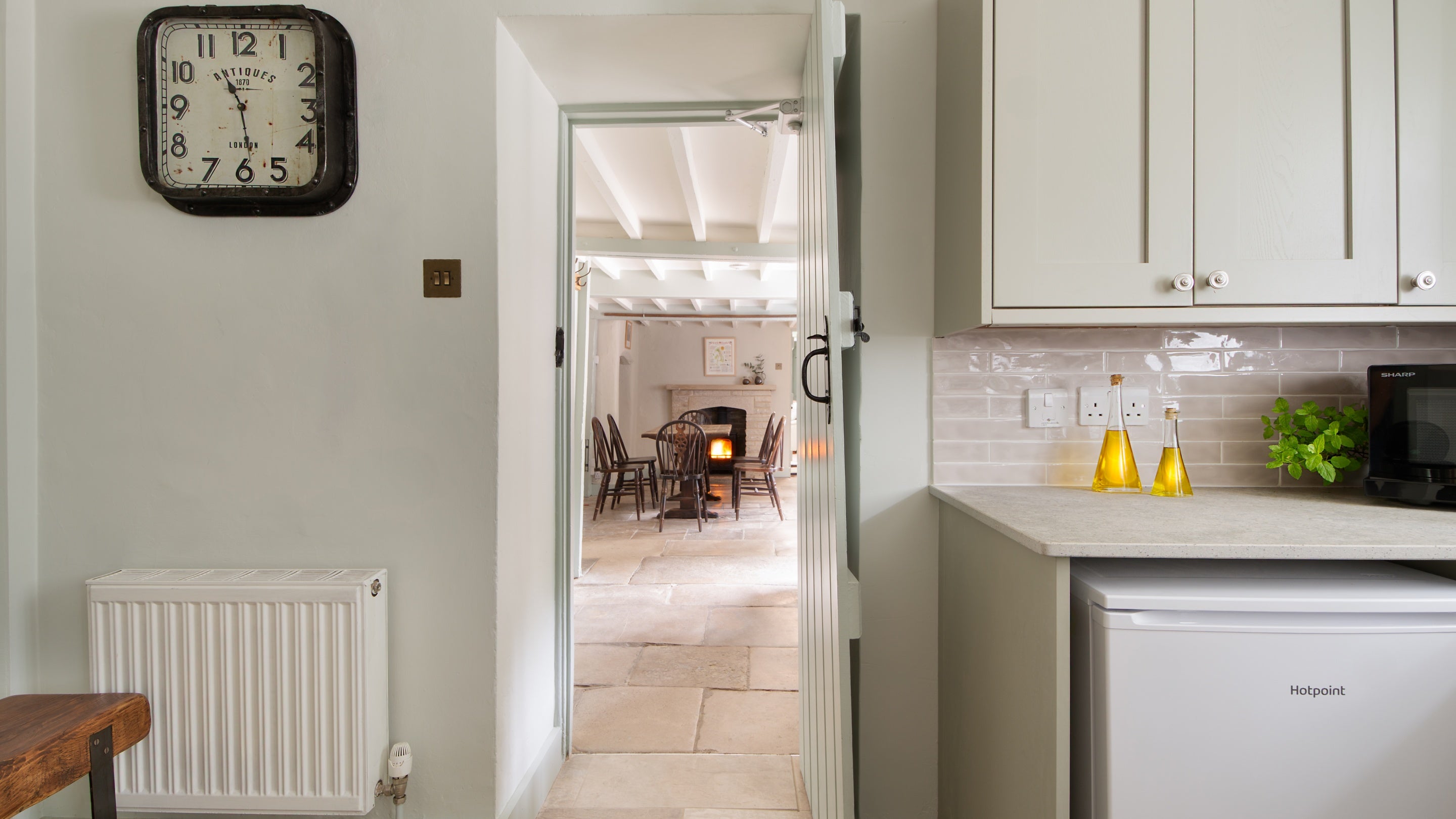 The kitchen leading into the dining room at Boar Mill Cottage, Dorset