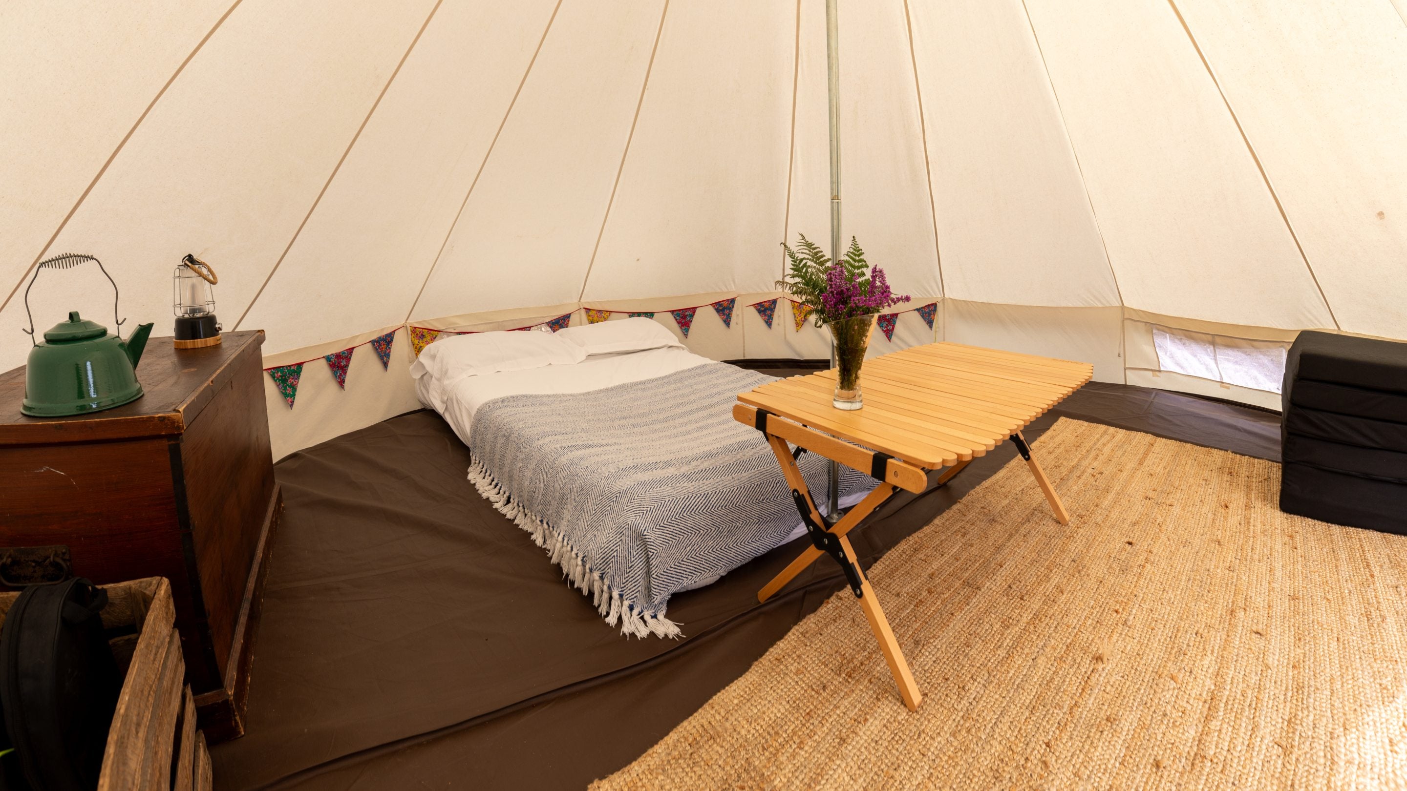 The interior of a bell tent at Brownsea Island Campsite, Dorset