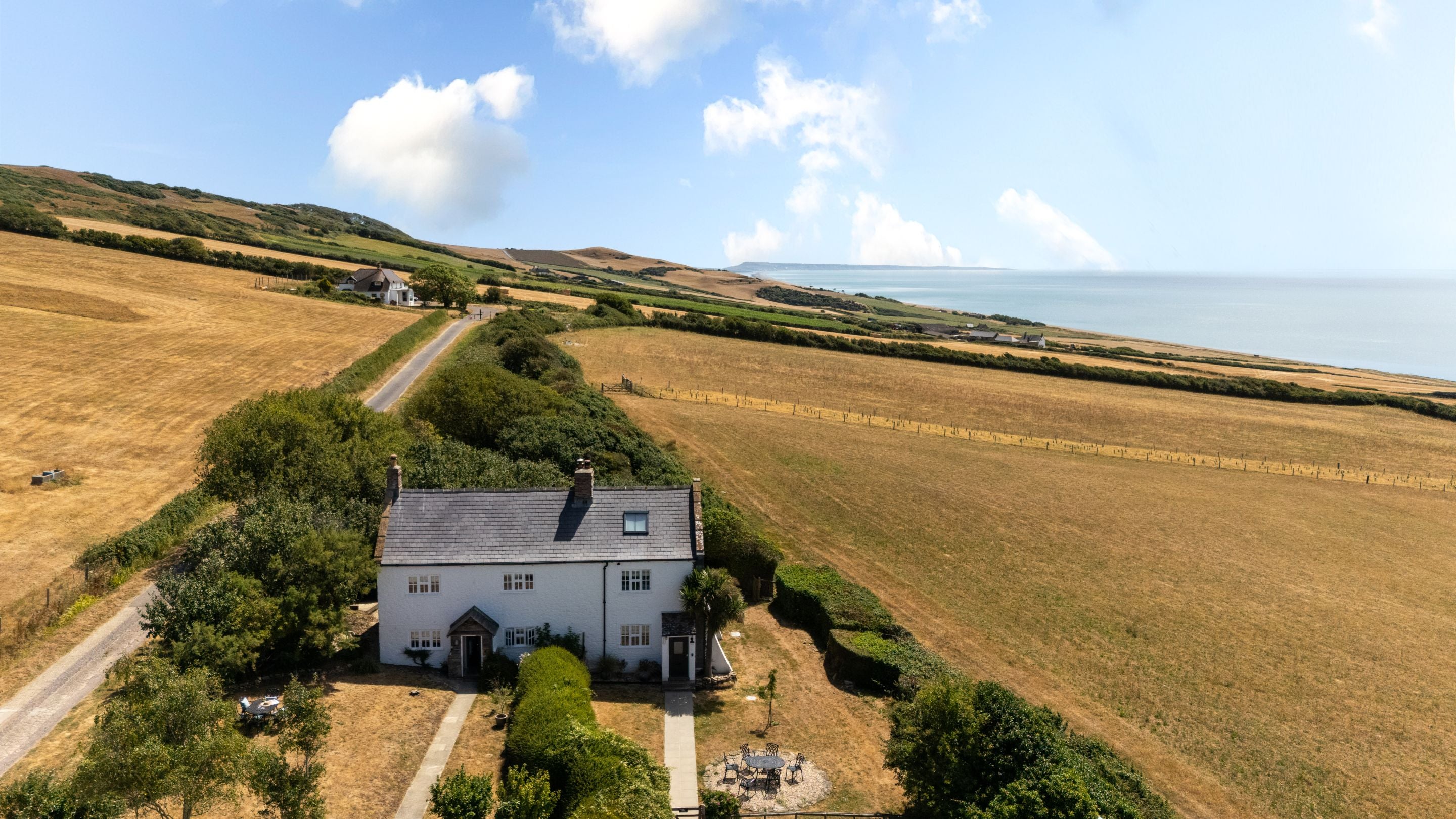 An aerial view of Chesil Cottage and Labour in Vain Cottage, Dorset