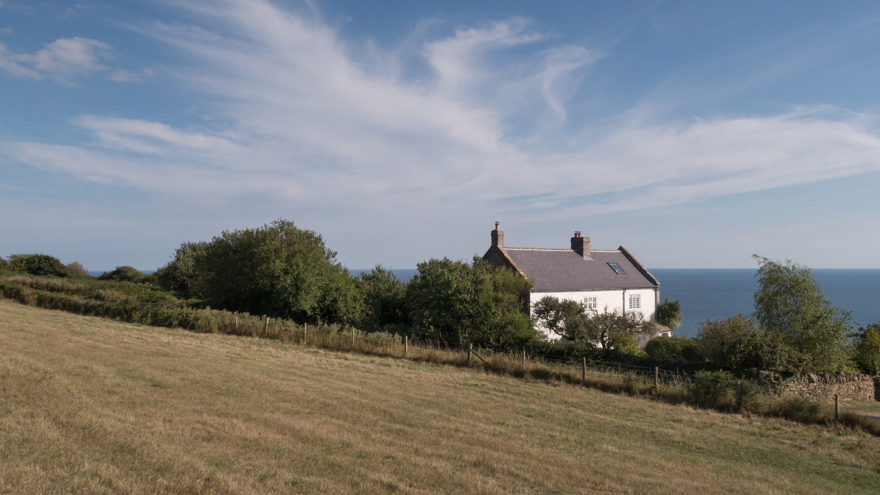Labour in Vain Cottage (on the left) before restoration and Chesil Cottage (on the right), Dorset