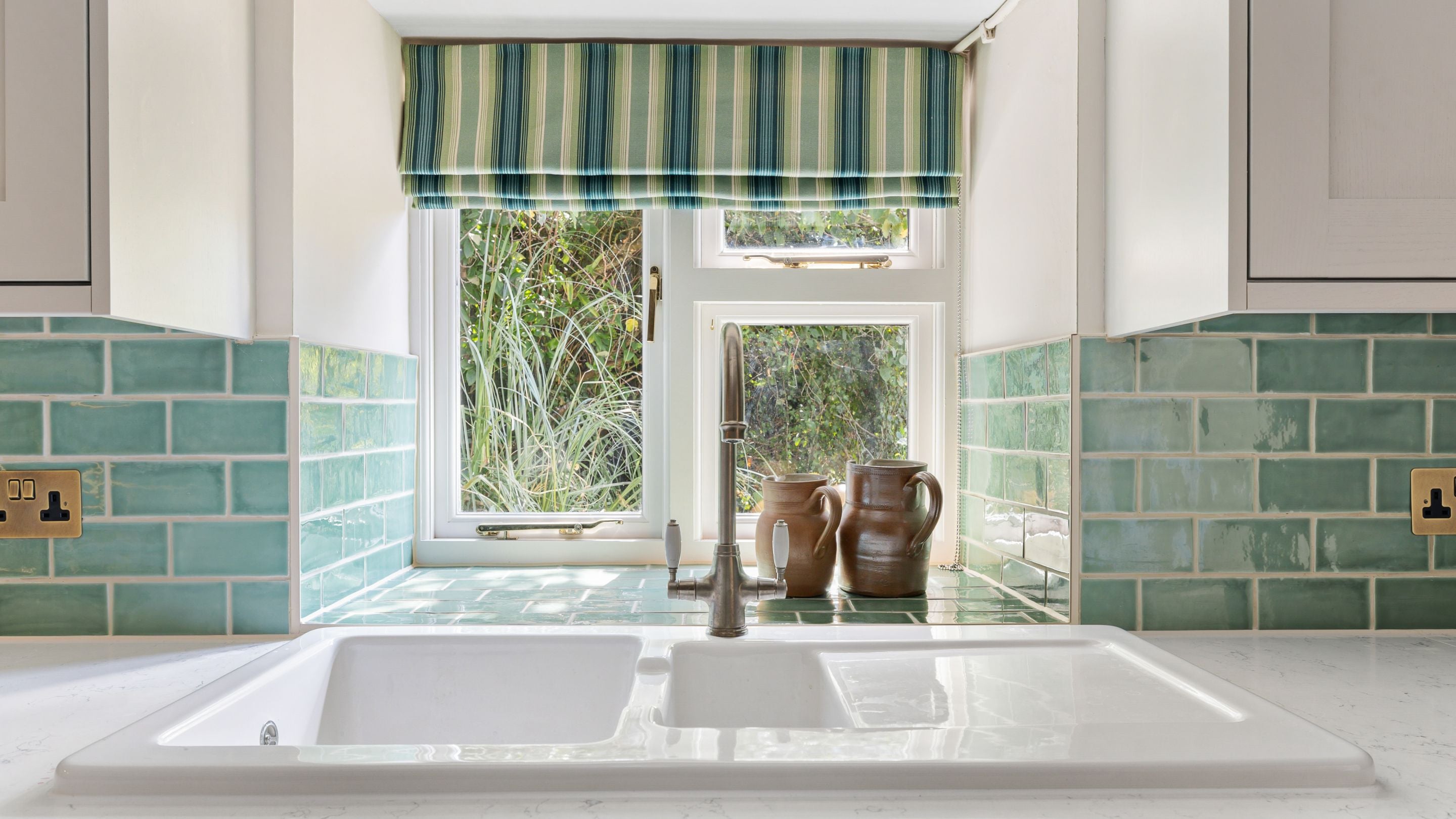 The kitchen window above the sink at Labour in Vain Cottage
